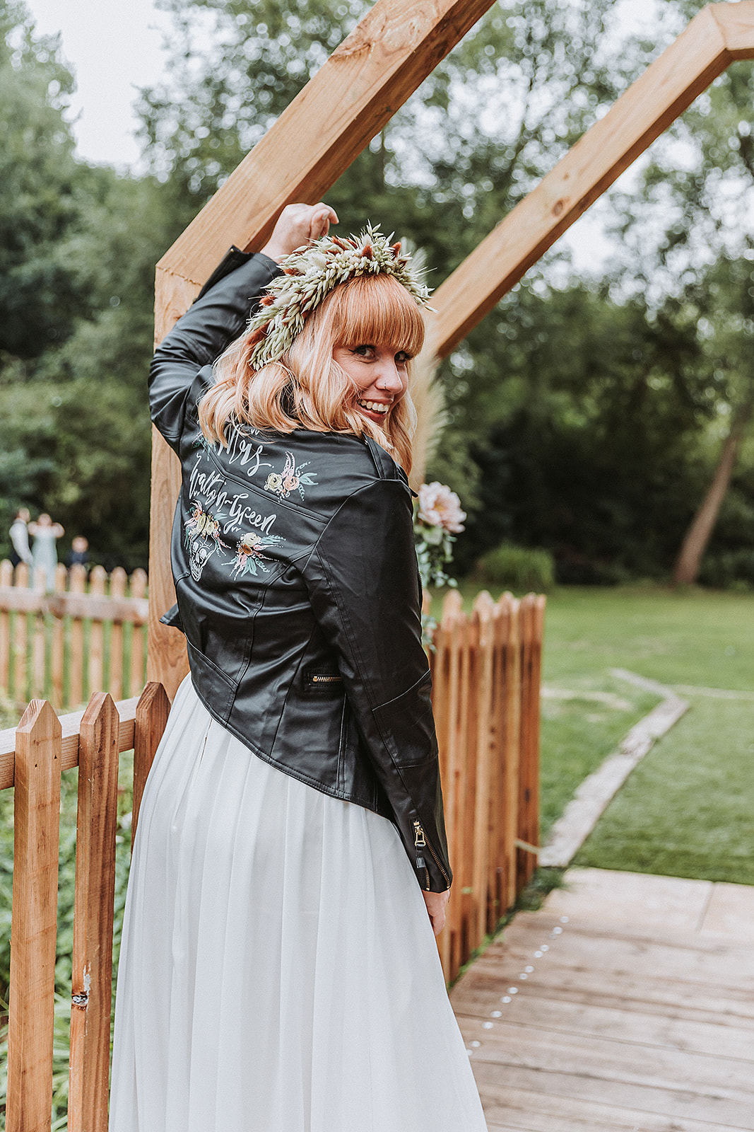 Bride in her new personalised mrs leather jacket The waterside venue rickmansworth wedding photographer photography hert