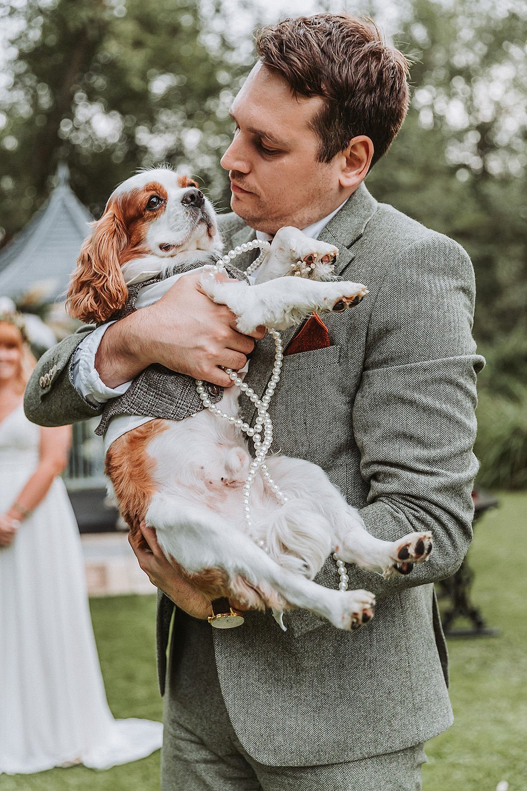 best man and dog at a wedding in the waterside venue rickmansworth wedding photographer hertfordshire