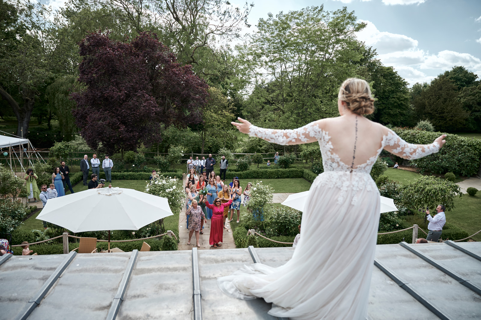 Bouquet toss Houchins wedding venue