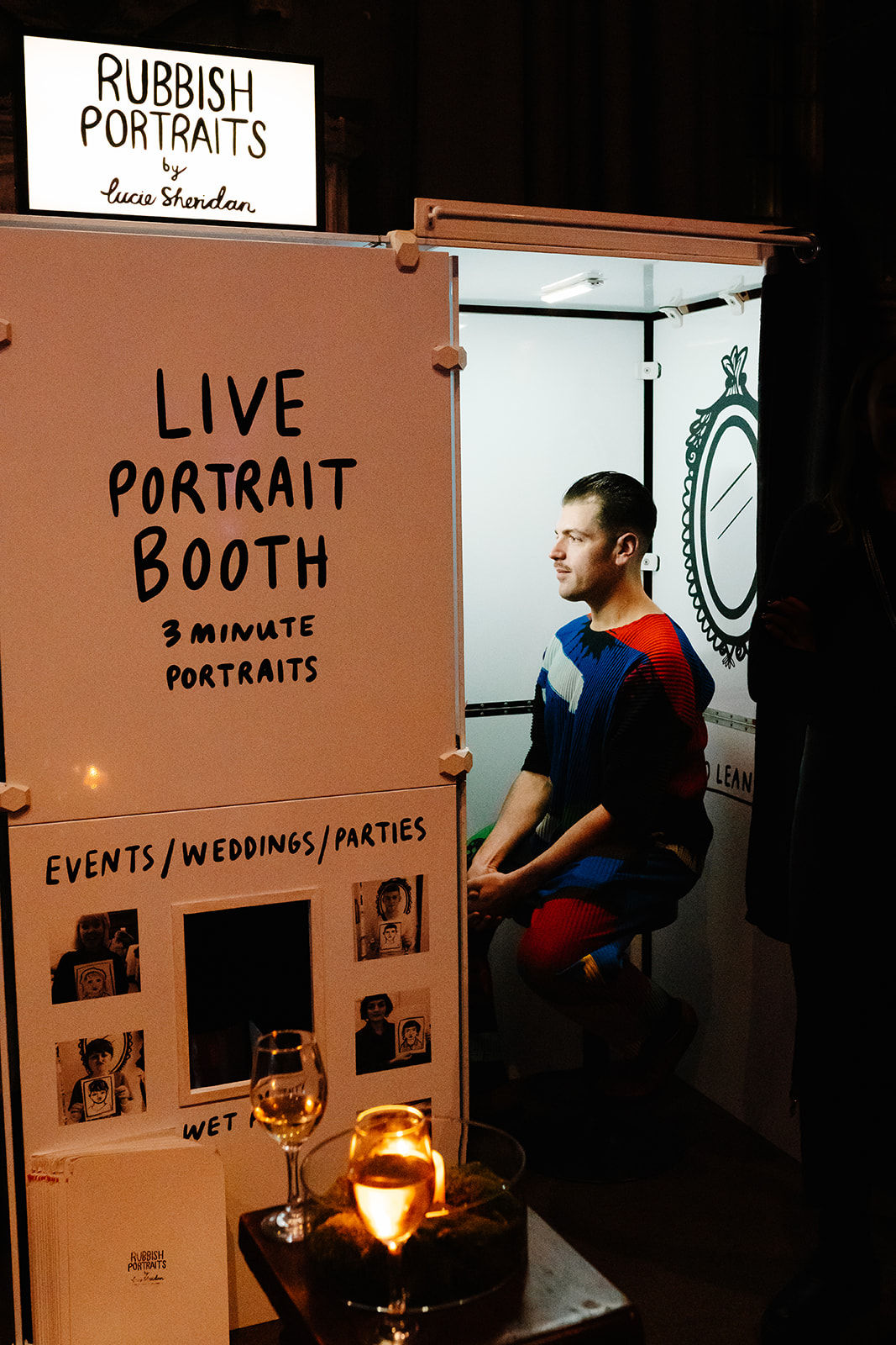 candid photo of guest in a drawing booth