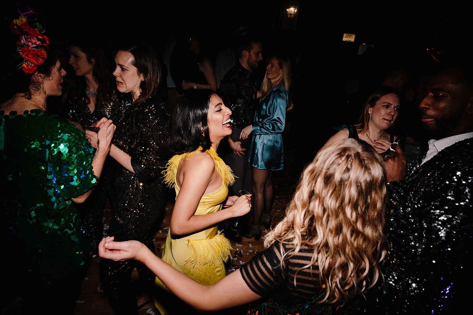 candid photo of guests dancing