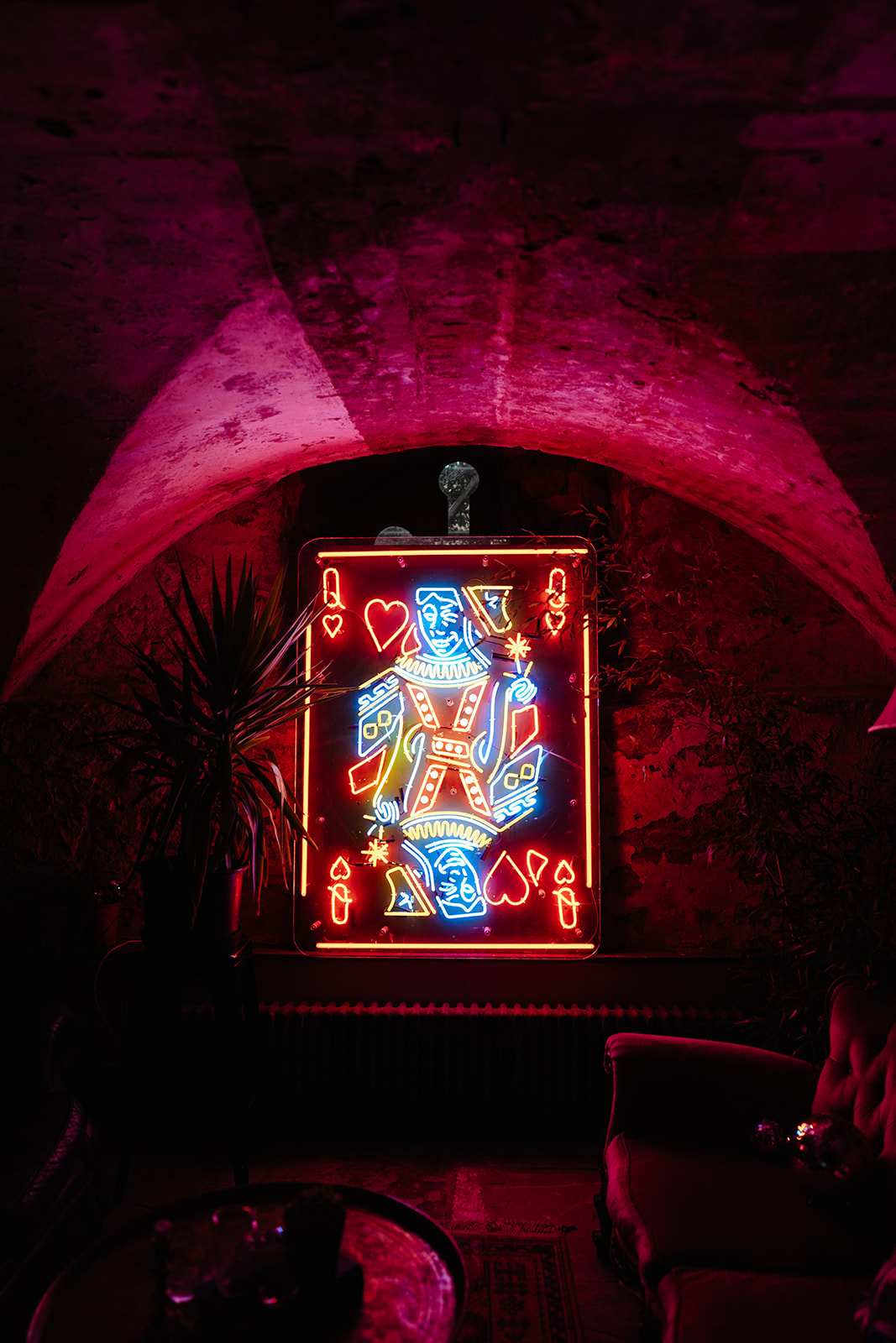 neon "queen of hearts" sign at Mount without