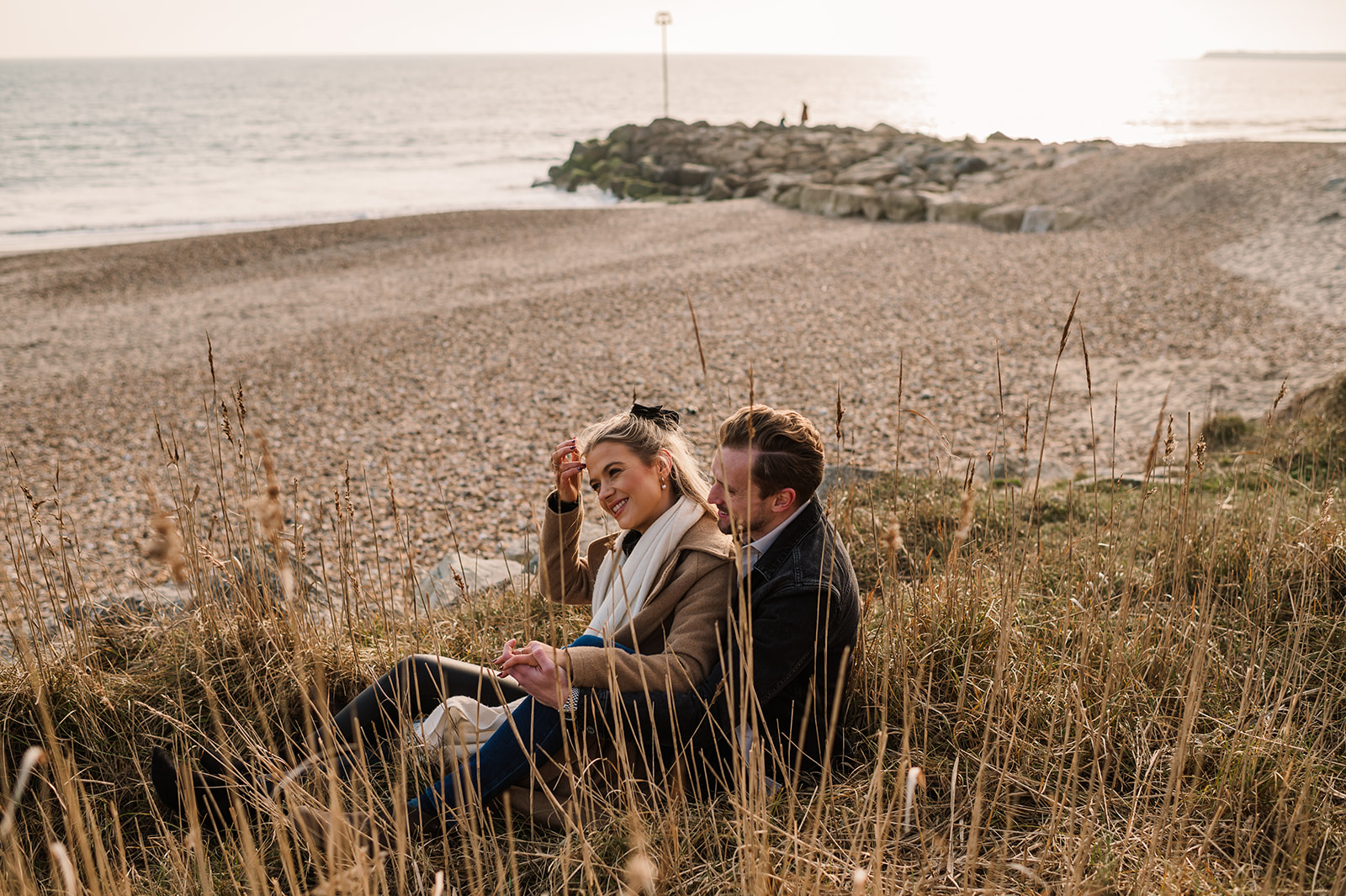 Engaged couple at Highcliffe Castle Beach