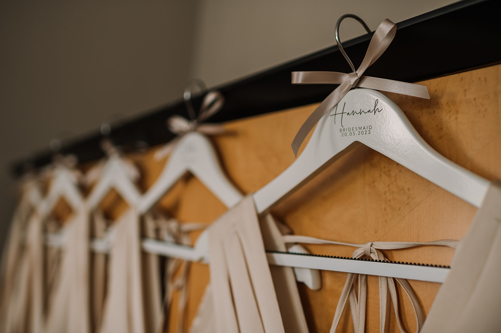 Photo of personalised bridesmaid dress hangers