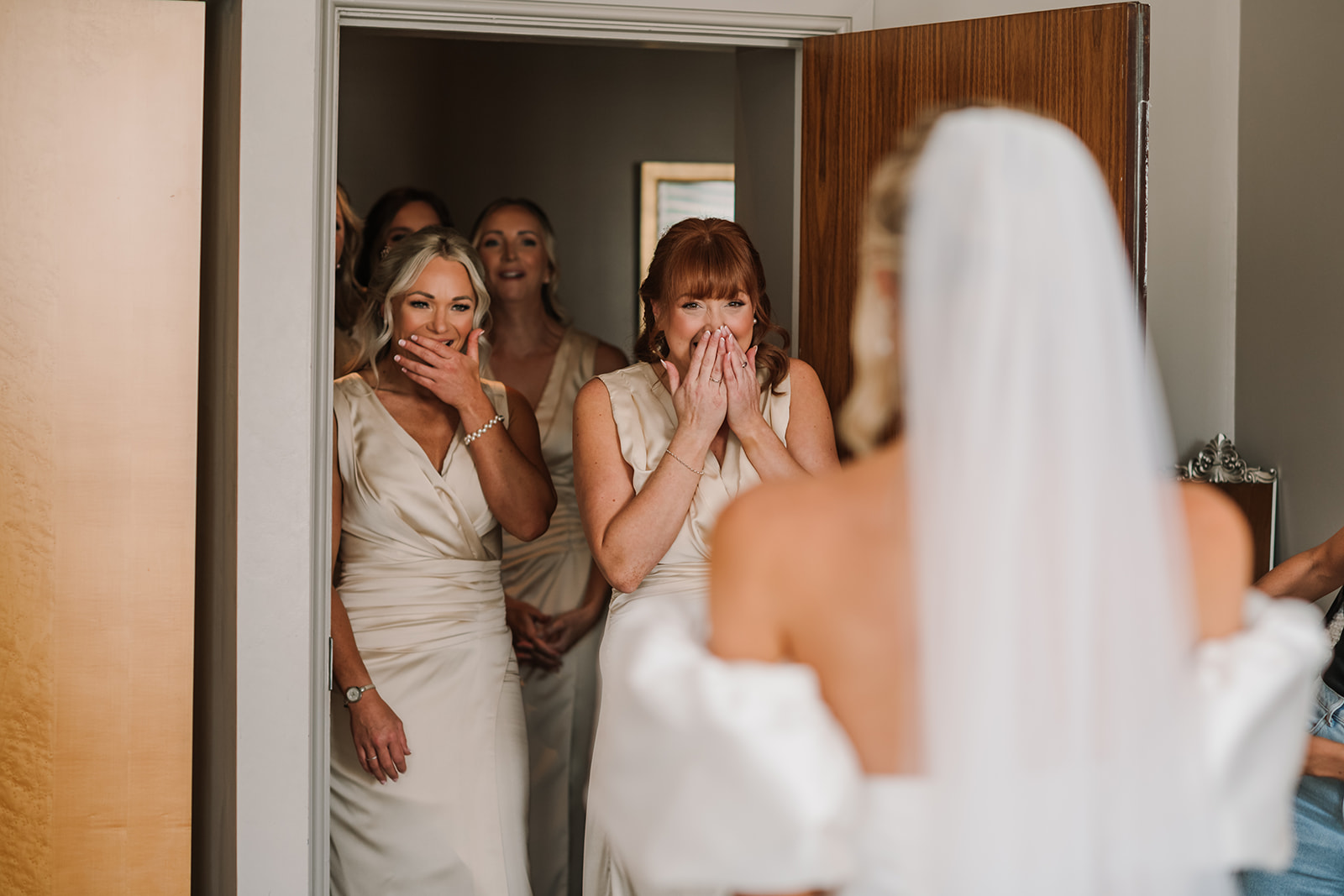 Bridesmaid reaction photo to beautiful Dorset Bride