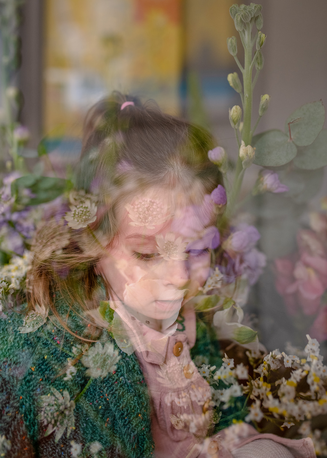 double exposed photograph of a girl and flowers during the natural maternity photography by agi lebiedz
