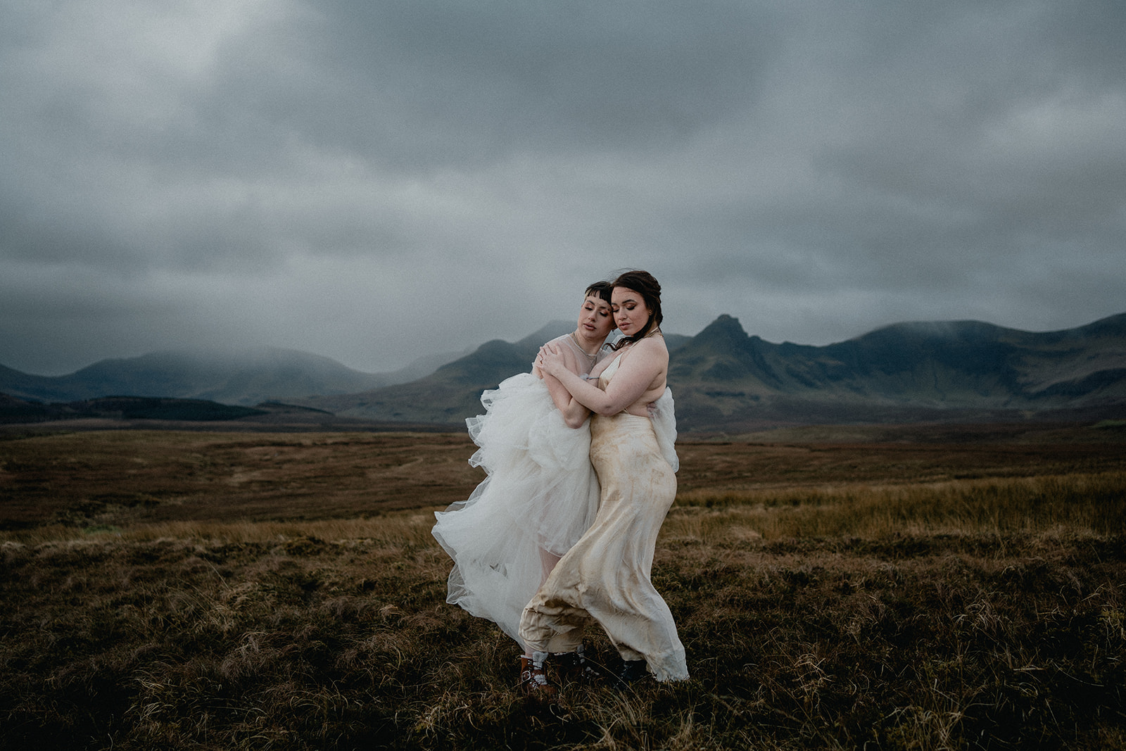 LGBTQI same-sex couple embrace before their Isle of Skye elopement ceremony