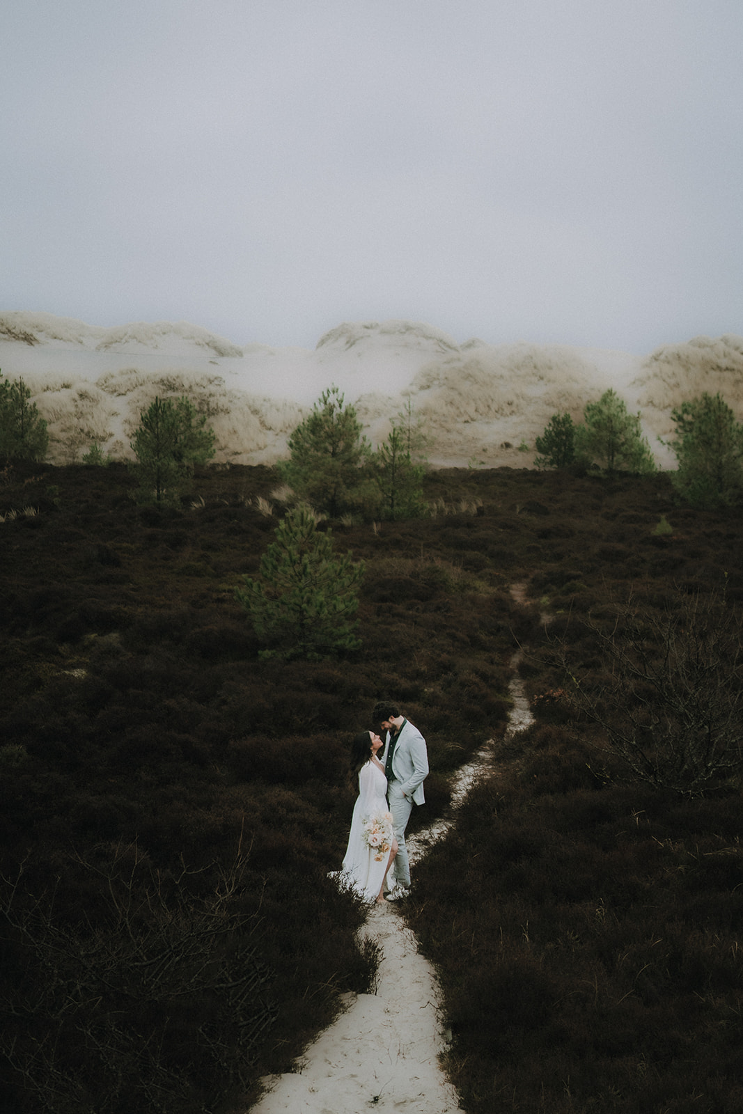 A couple who eloped in Netherlands Dunes