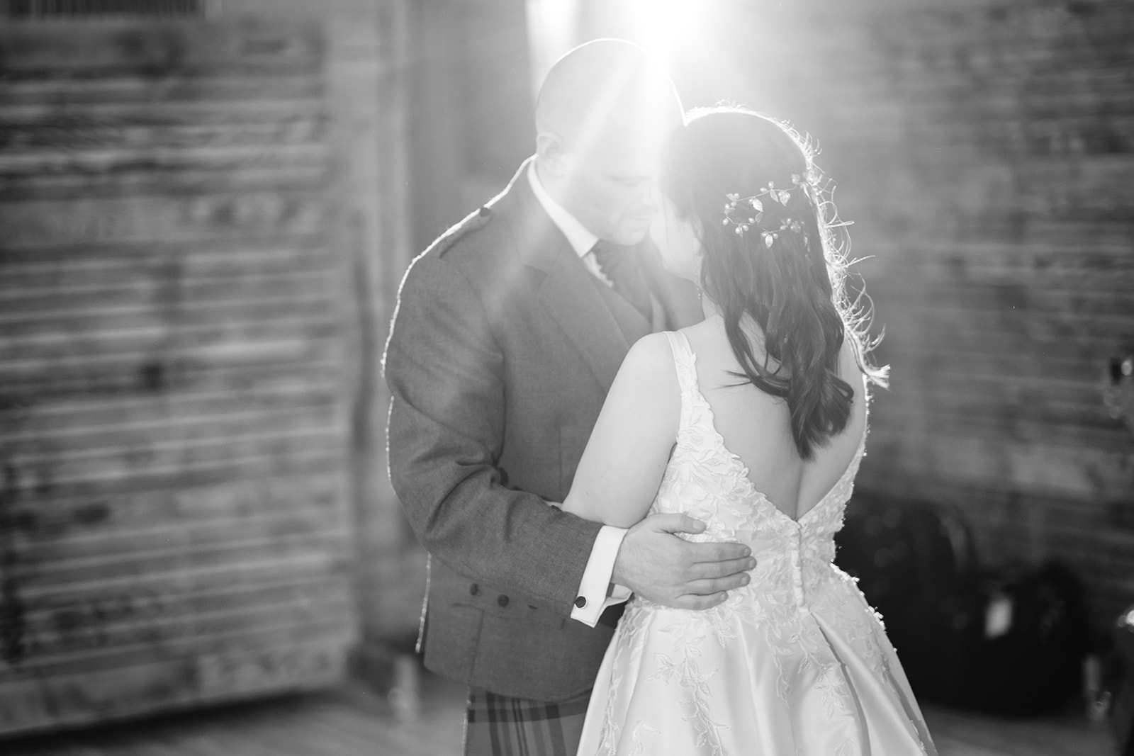 The married couple share their first wedding dance in front of their guests at Silverlodge, in Perthshire, Scotland.