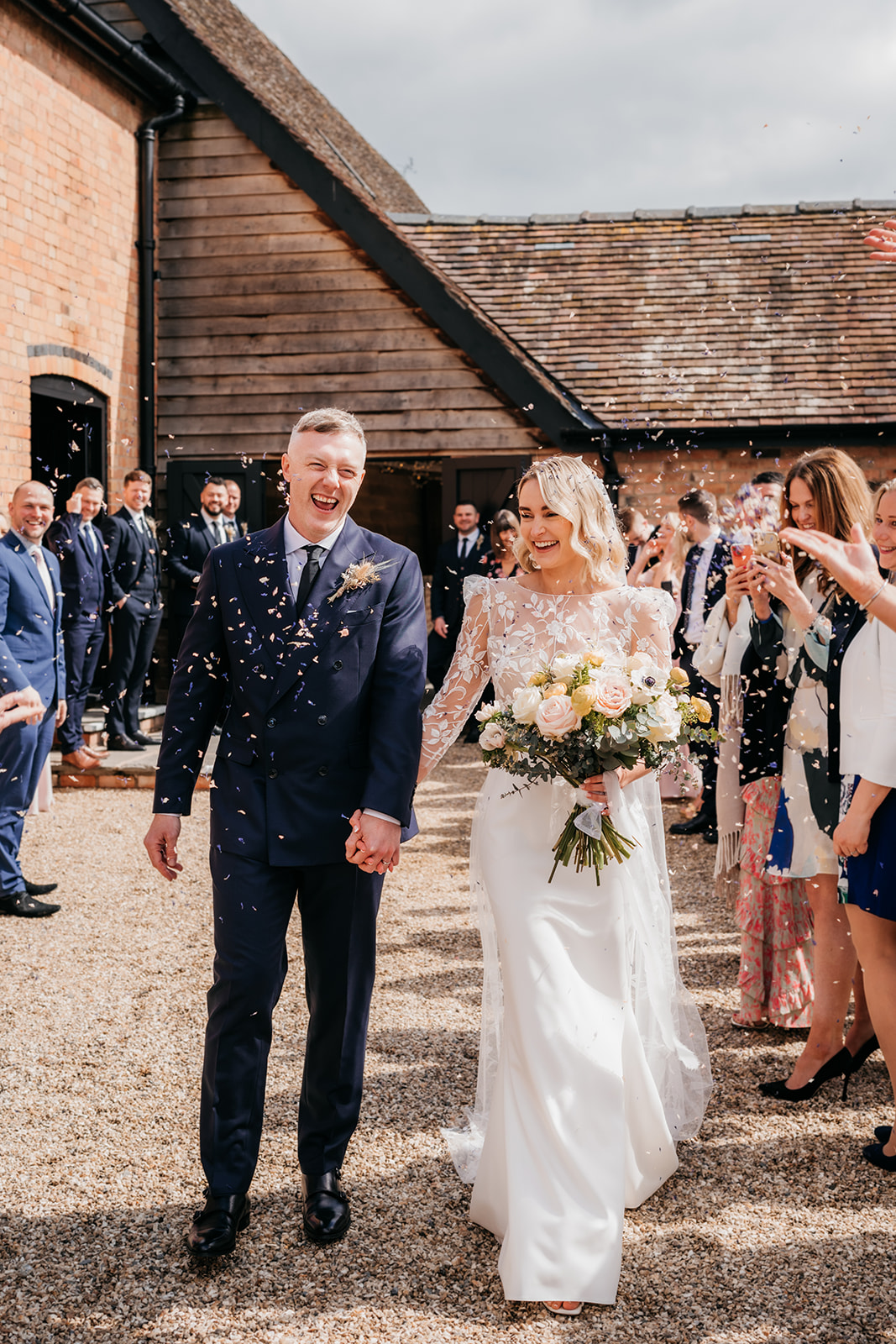 confetti at Barns and Yard captured by wedding videographer and photographer 