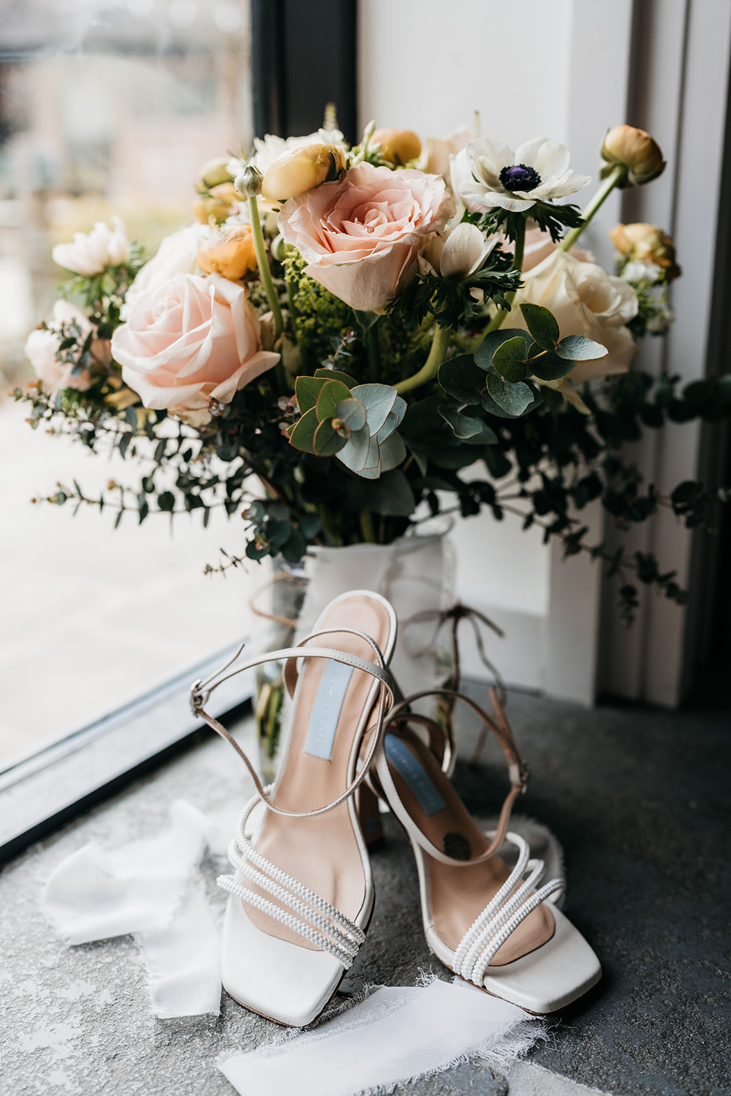 wedding flowers by Floral Findings and wedding shoes