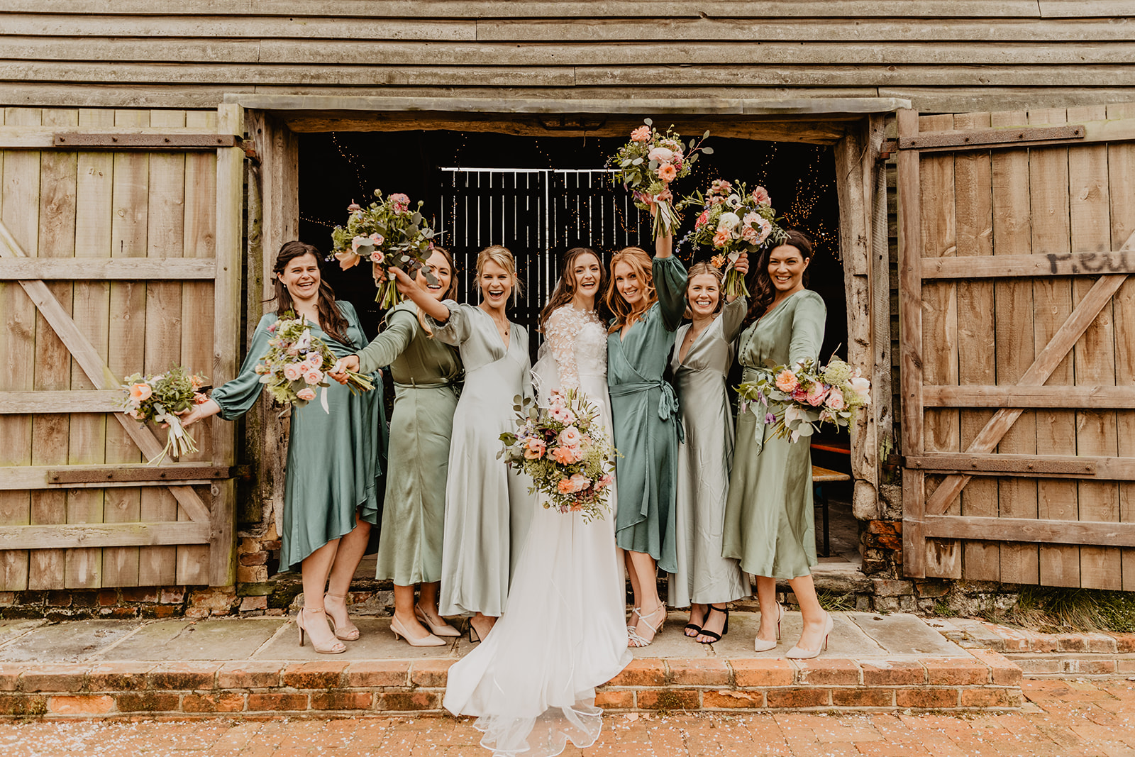 Bride and bridesmaids at a Secret Barn Wedding, West Sussex. By Olive Joy Photography