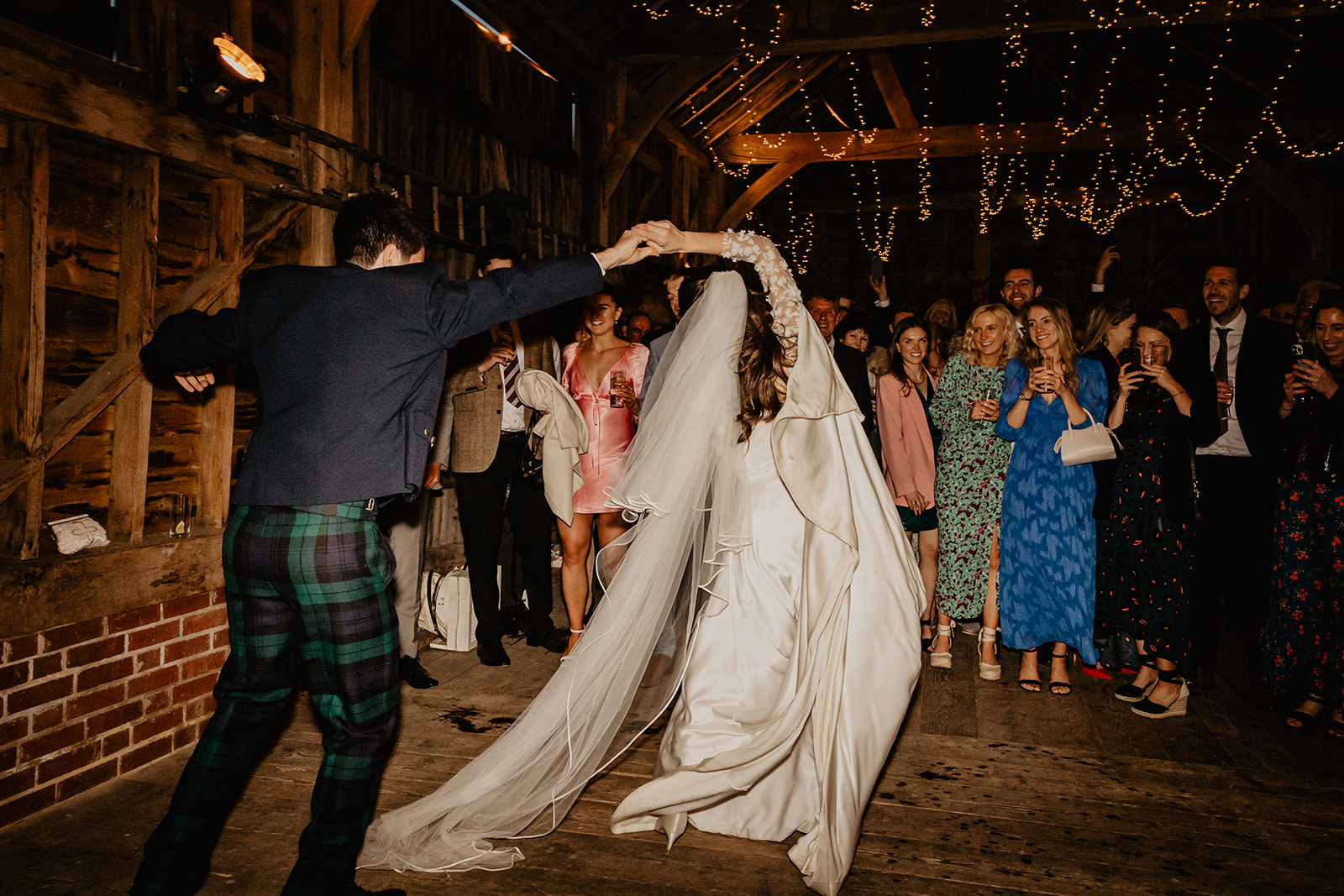 Bride and groom first dance at a Secret Barn Wedding, West Sussex. By Olive Joy Photography