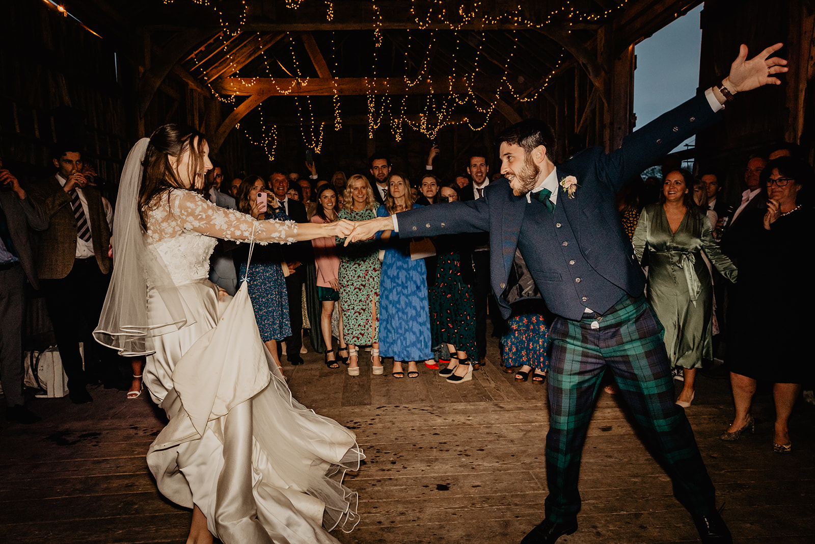 Bride and groom first dance at a Secret Barn Wedding, West Sussex. By Olive Joy Photography