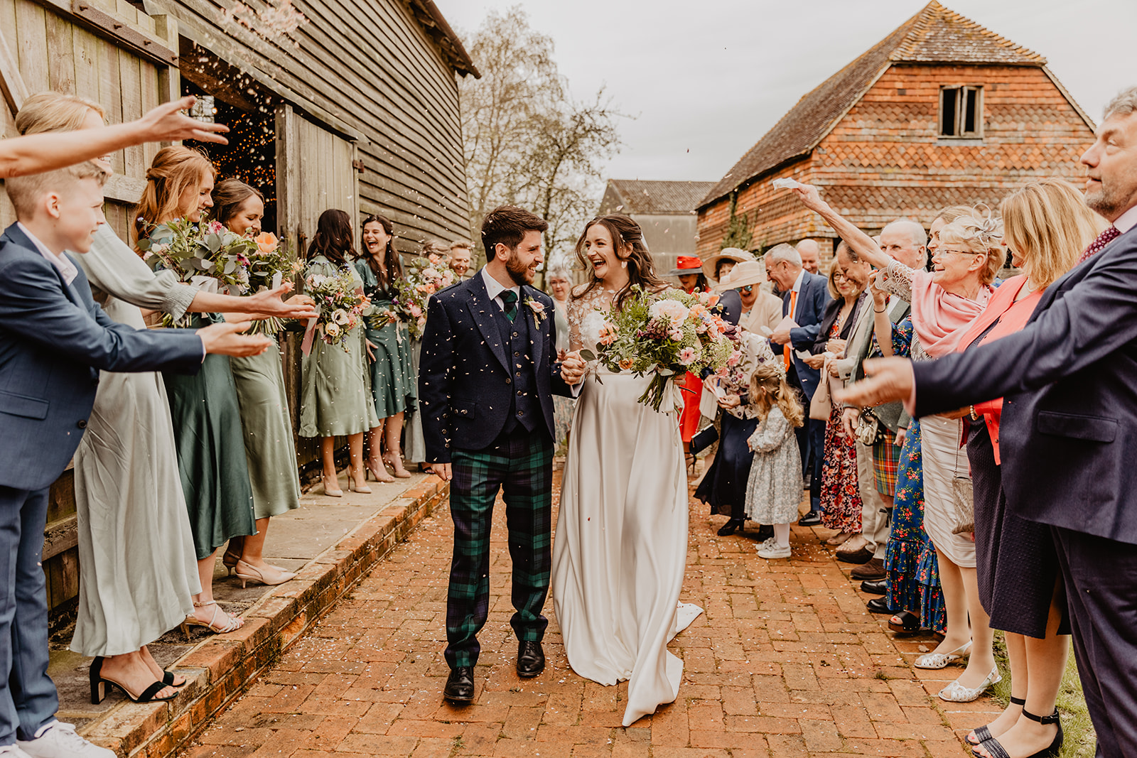 Bride and Groom outside a Secret Barn Wedding, West Sussex. By Olive Joy Photography