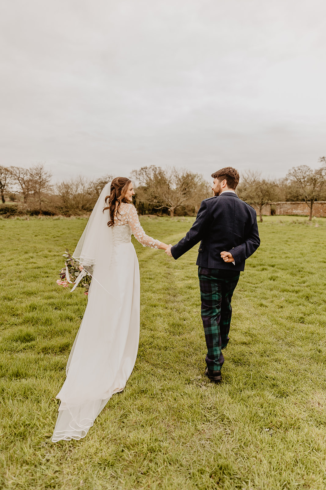Bride and groom at a Secret Barn Wedding, West Sussex. By Olive Joy Photography