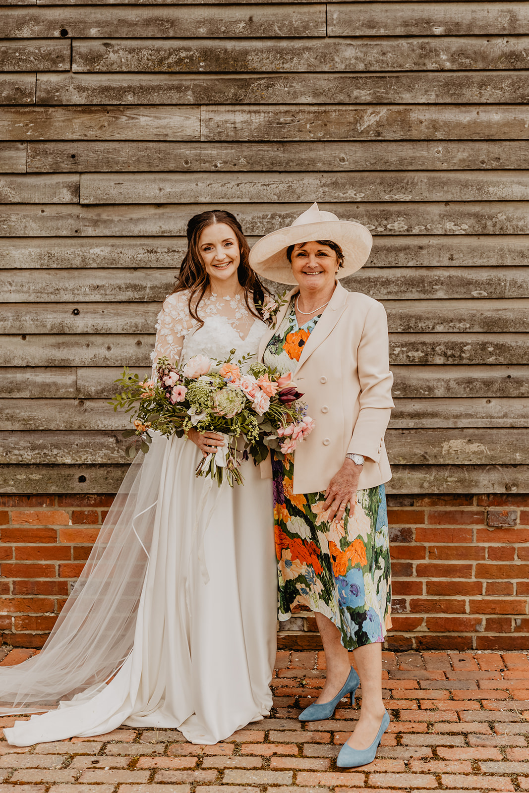 Bride with mother at a Secret Barn Wedding, West Sussex. By Olive Joy Photography