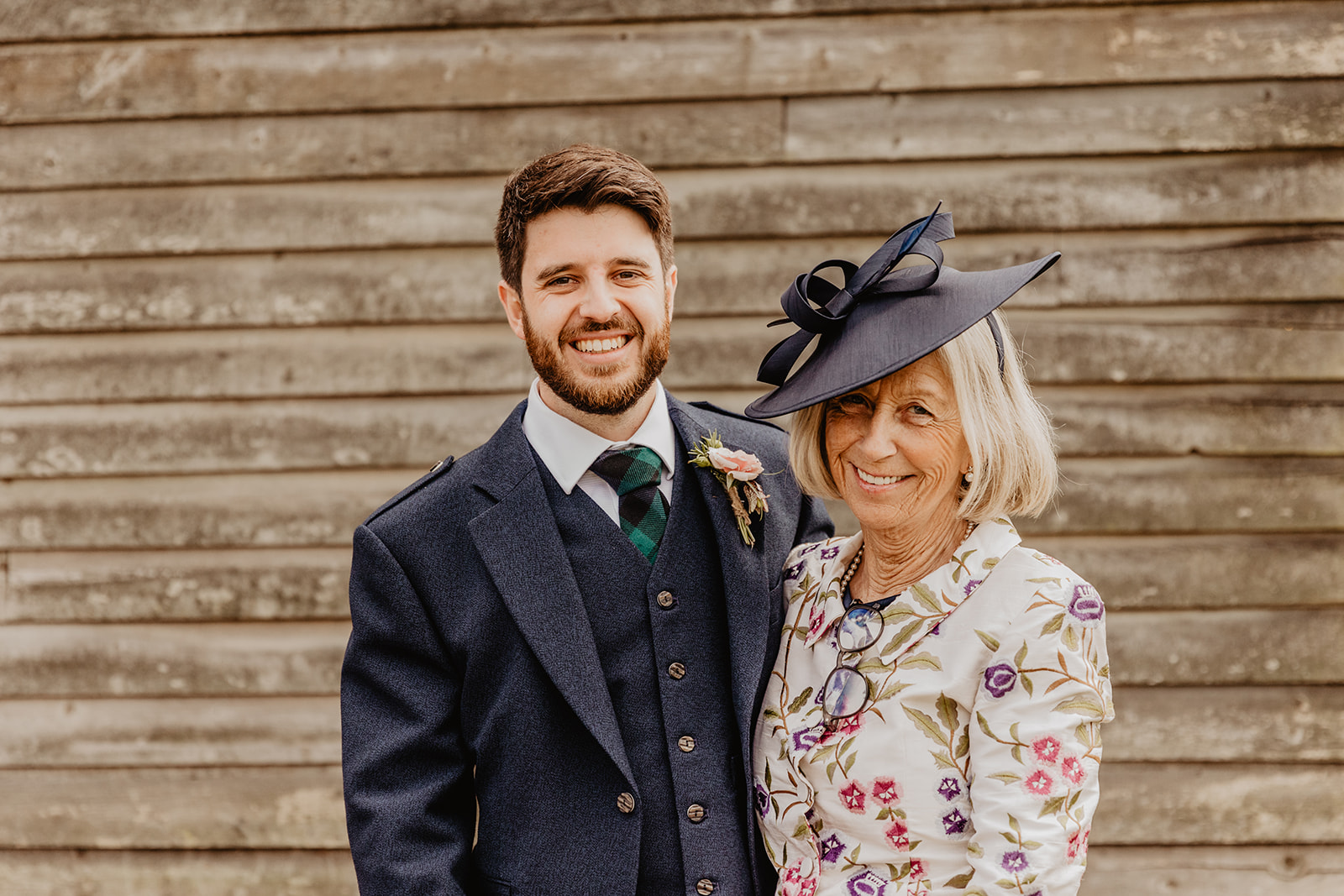 Groom and mother at a Secret Barn Wedding, West Sussex. By Olive Joy Photography