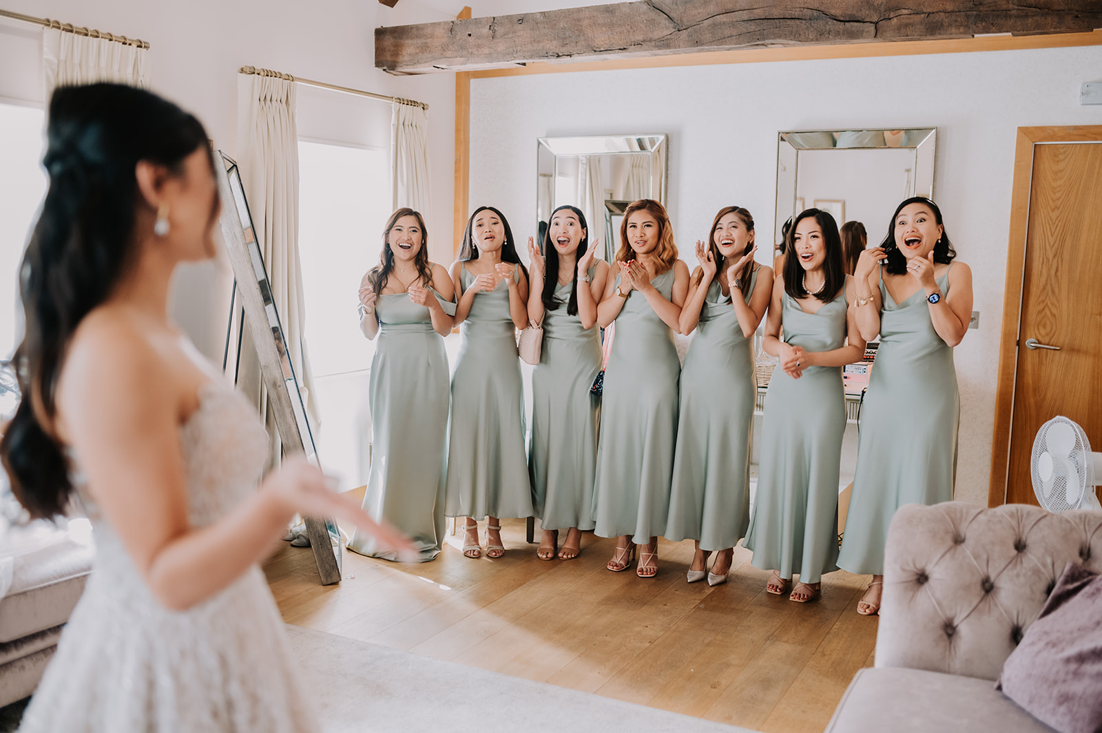 bridesmaids reacting to seeing bride in wedding dress at Pelham house wedding 