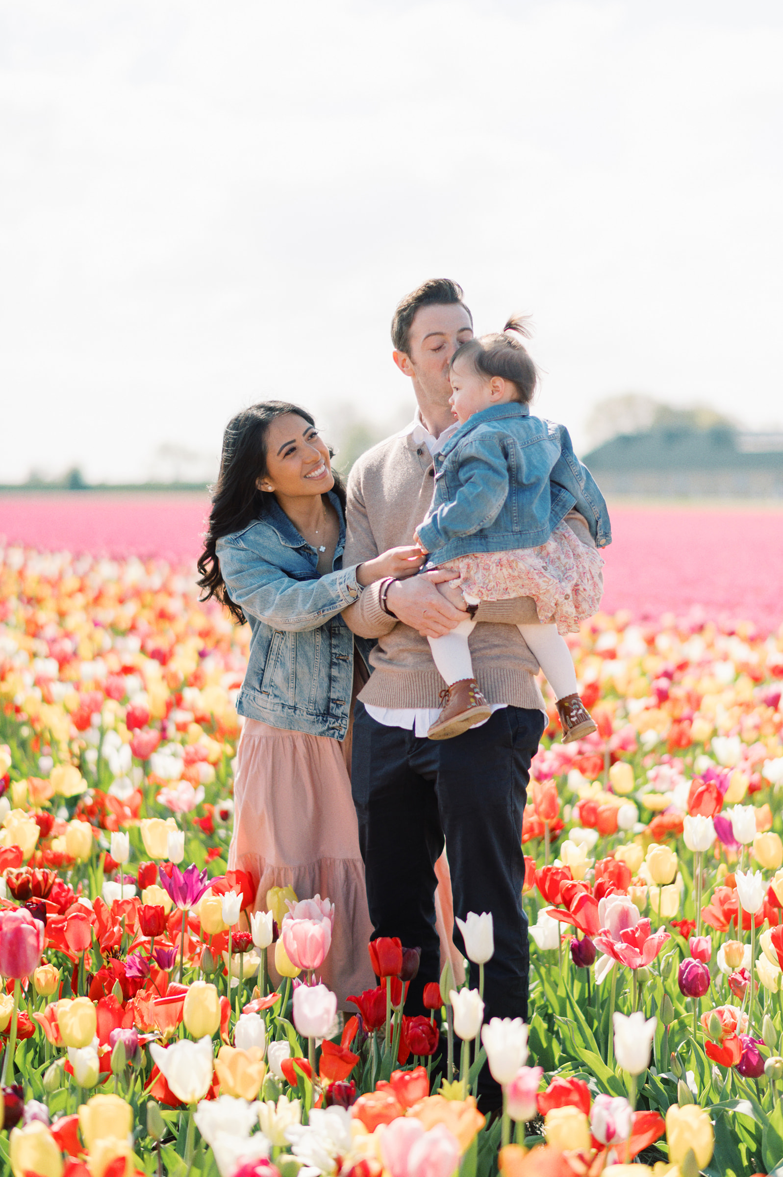 A family in the tulip fields in the Netherlands
