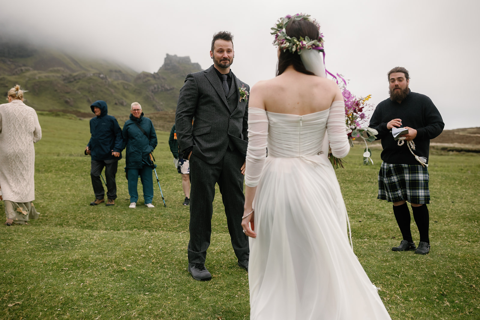 Nick's face lights up as he lays eyes on Becca for the first time in her gown during their Isle of Skye elopement 