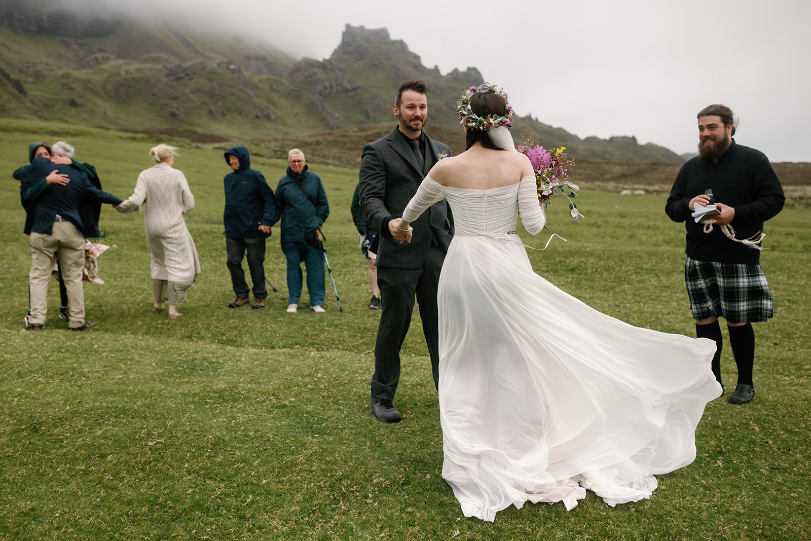 Nick's face lights up as he lays eyes on Becca for the first time in her gown during their Isle of Skye elopement 