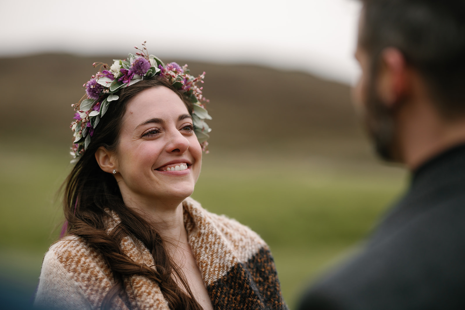 A genuine smile lights up Becca's face as she turns to see Nick for the first time during their Isle of Skye elopement