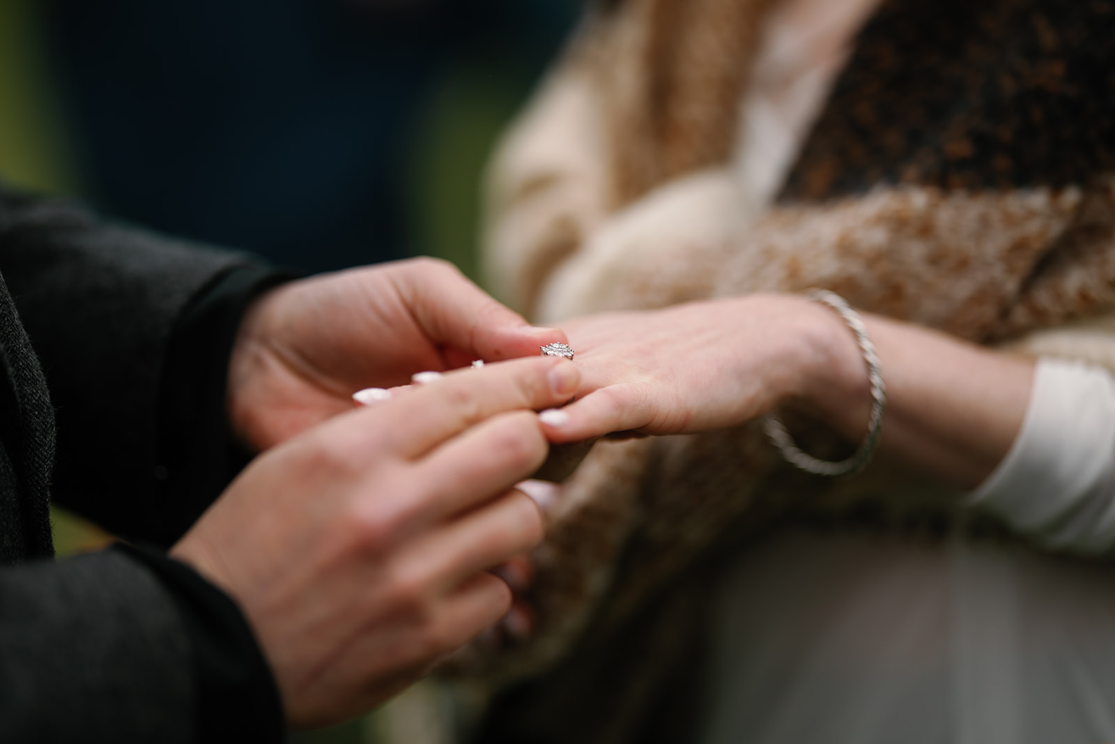 Becca and Nick exchange rings, sealing their commitment during their Isle of Skye elopement