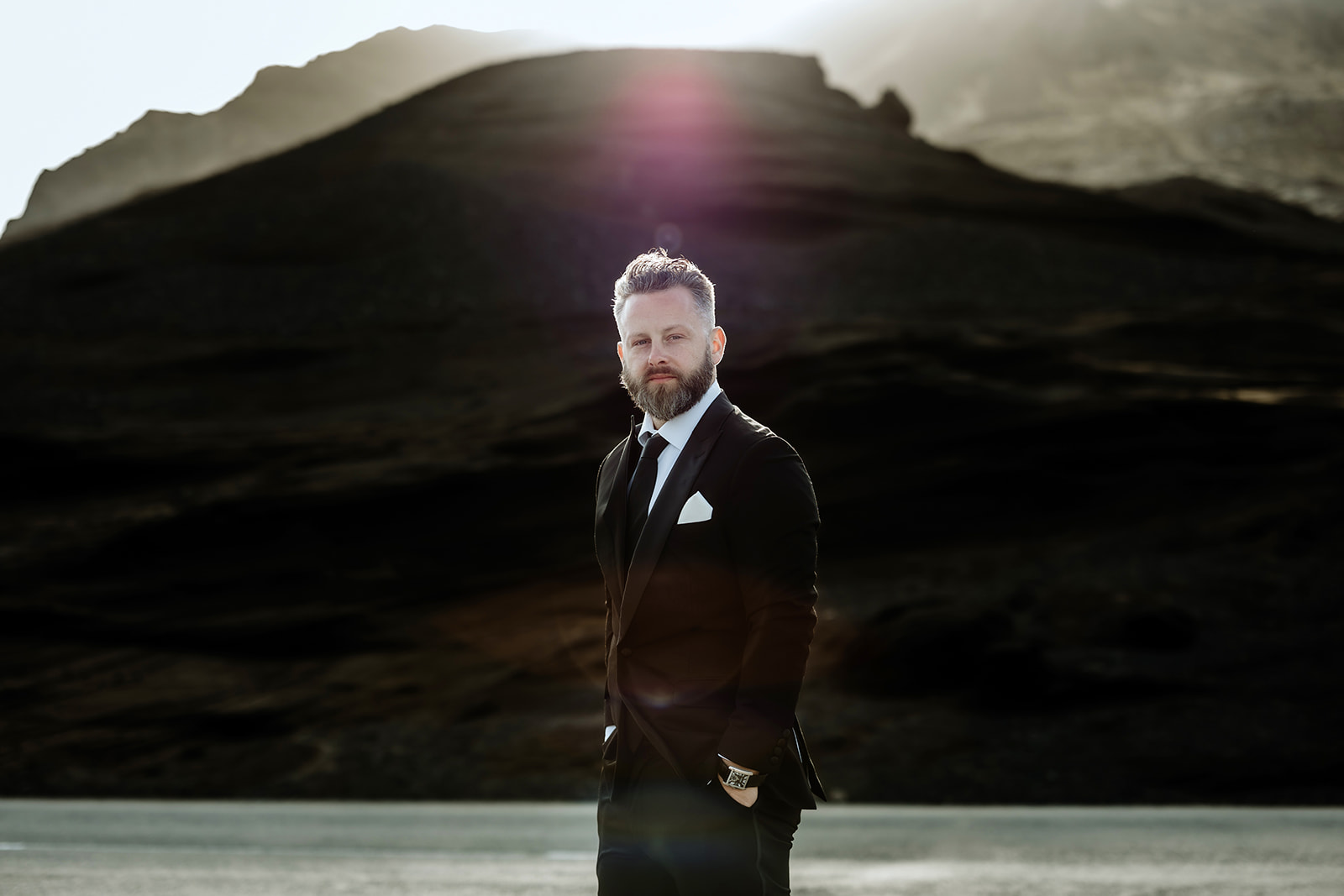 Groom portrait in the midnight sun in Iceland