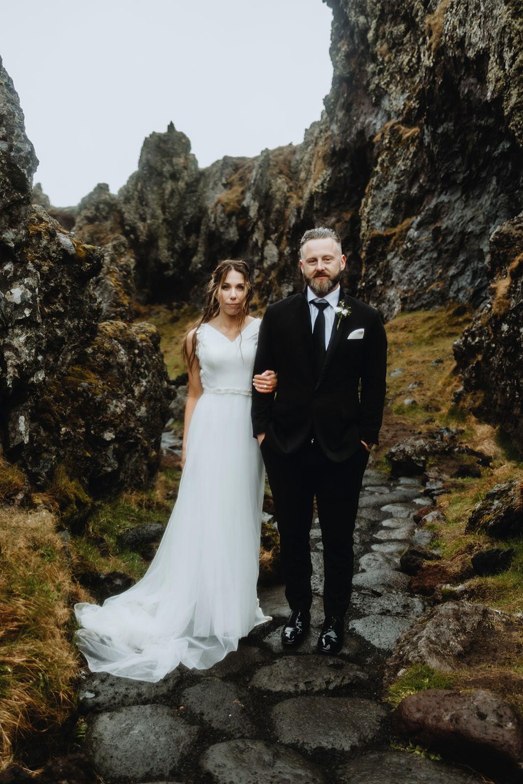 Married couple portrait in the rain in Iceland