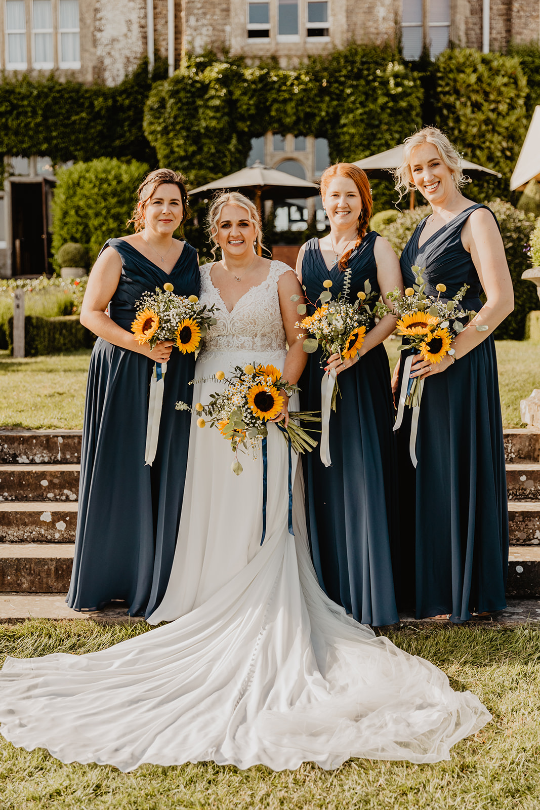Bride and bridesmaids at a South Lodge, Sussex Wedding. By Olive Joy Photography