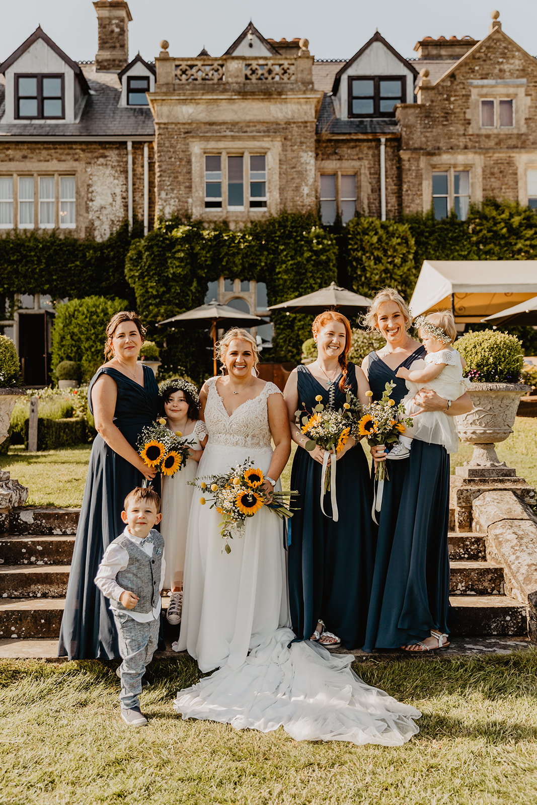 Bride and bridesmaids at a South Lodge, Sussex Wedding. By Olive Joy Photography