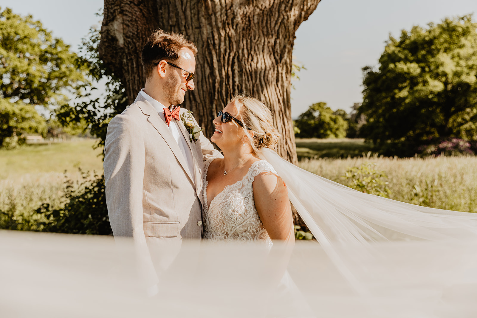 Bride and groom outside at a South Lodge, Sussex Wedding. By Olive Joy Photography