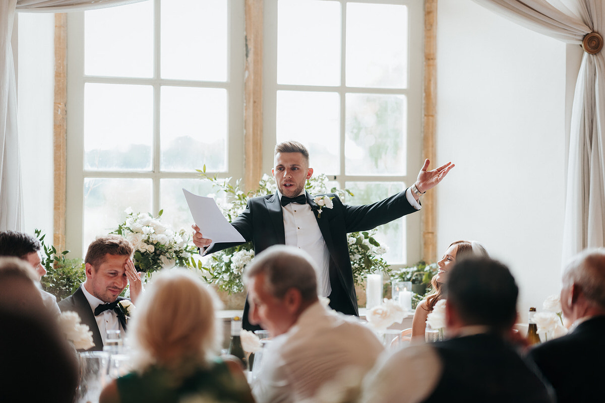 groom delivering his wedding speech at Brympton House