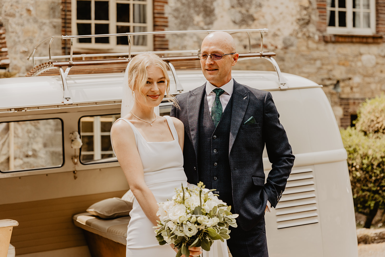 Bride and father by VW camper at a Bury Manor Barn Wedding in Sussex. Photographer OliveJoy Photography.