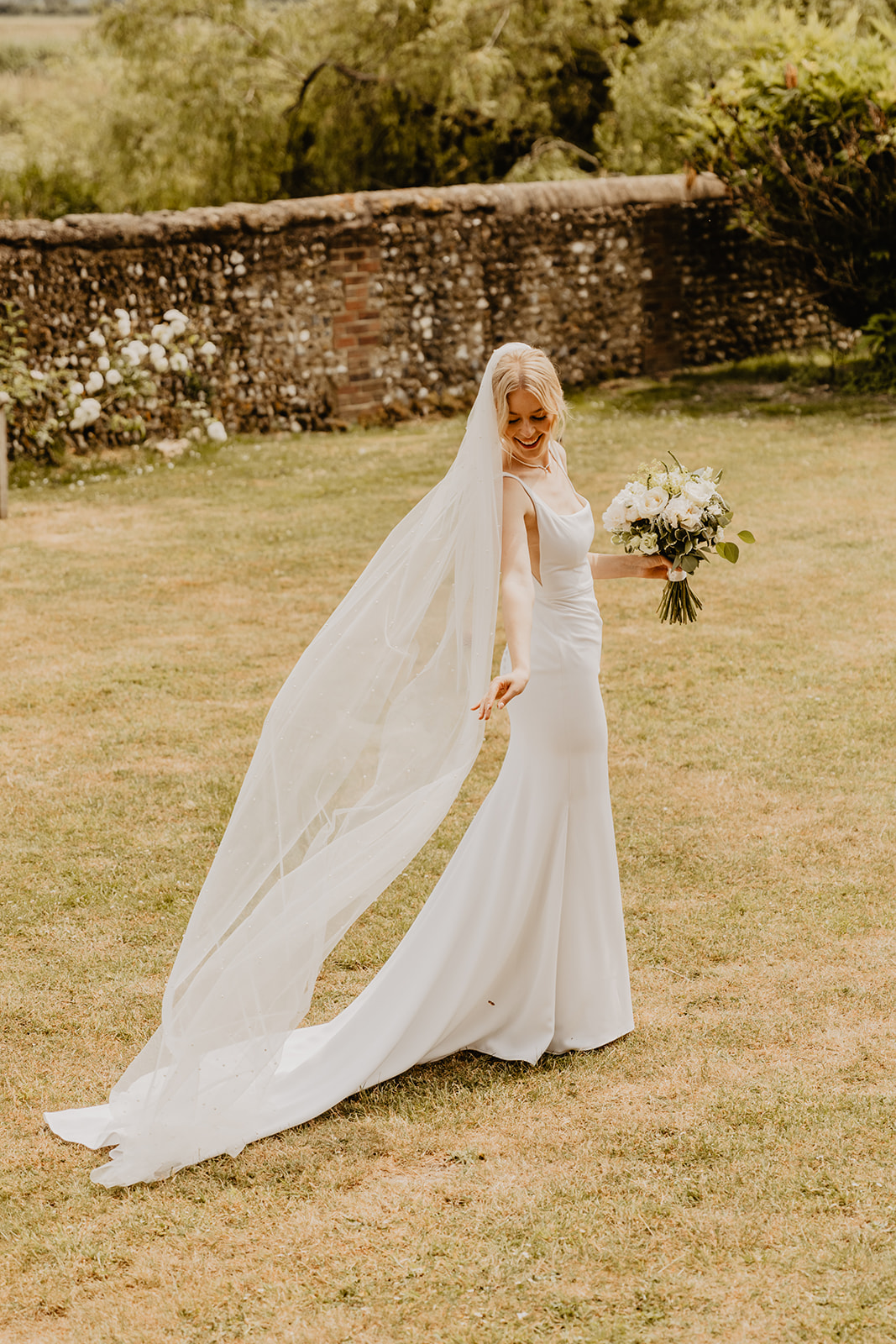 Brideat a Bury Manor Barn Wedding in Sussex. Photographer OliveJoy Photography.