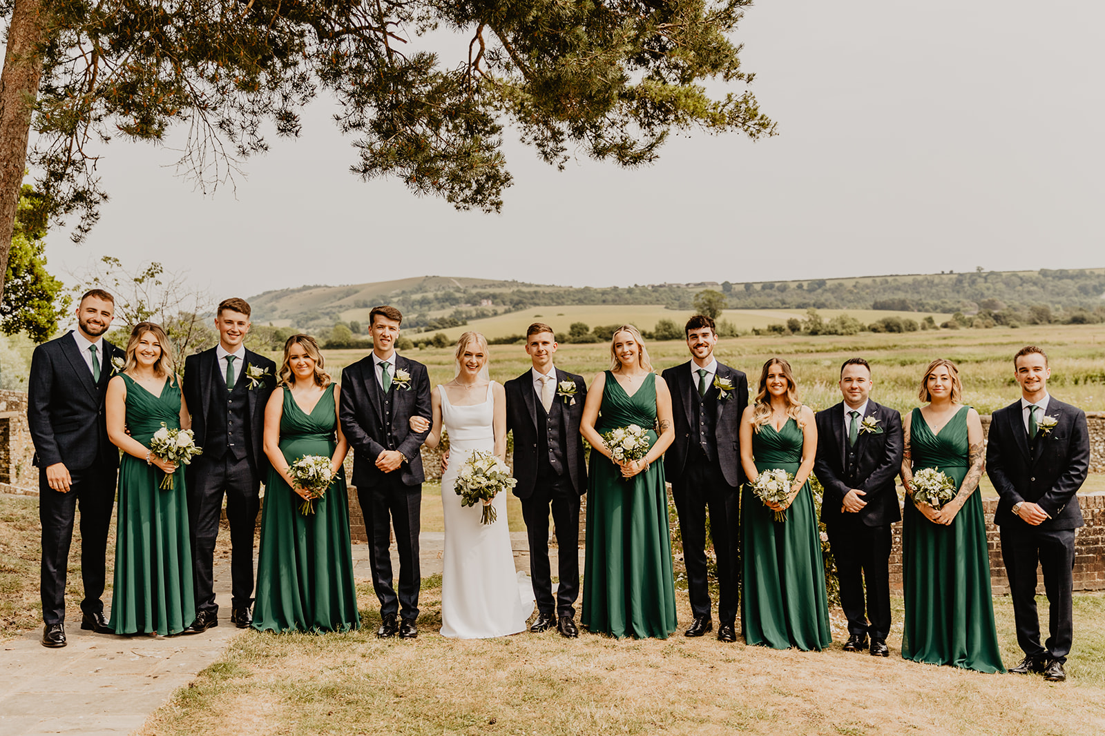 Wedding Party group photos at a Bury Manor Barn Wedding in Sussex. Photographer OliveJoy Photography.