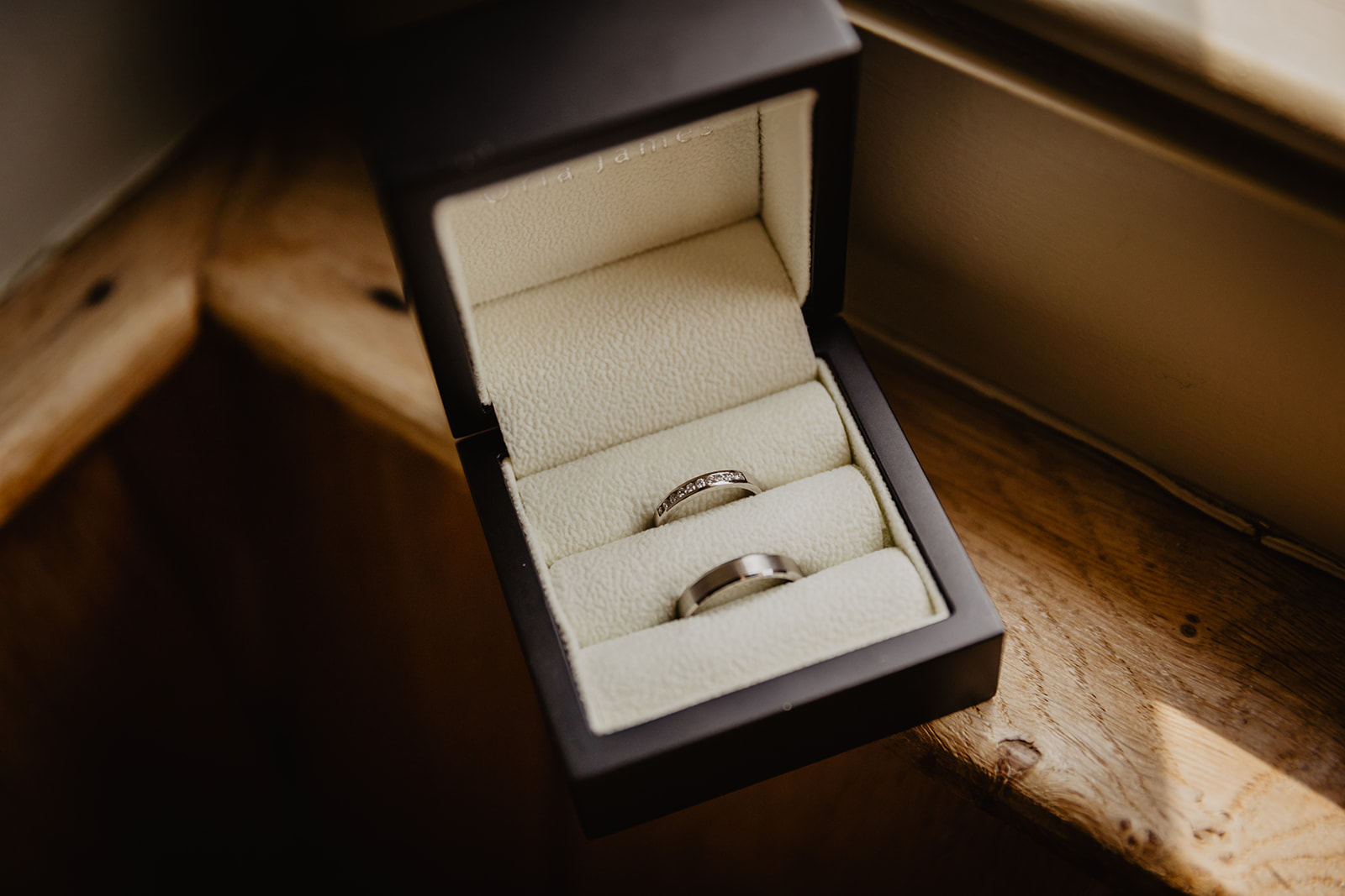 Wedding rings in a box at a Bury Manor Barn Wedding in Sussex. Photographer OliveJoy Photography.