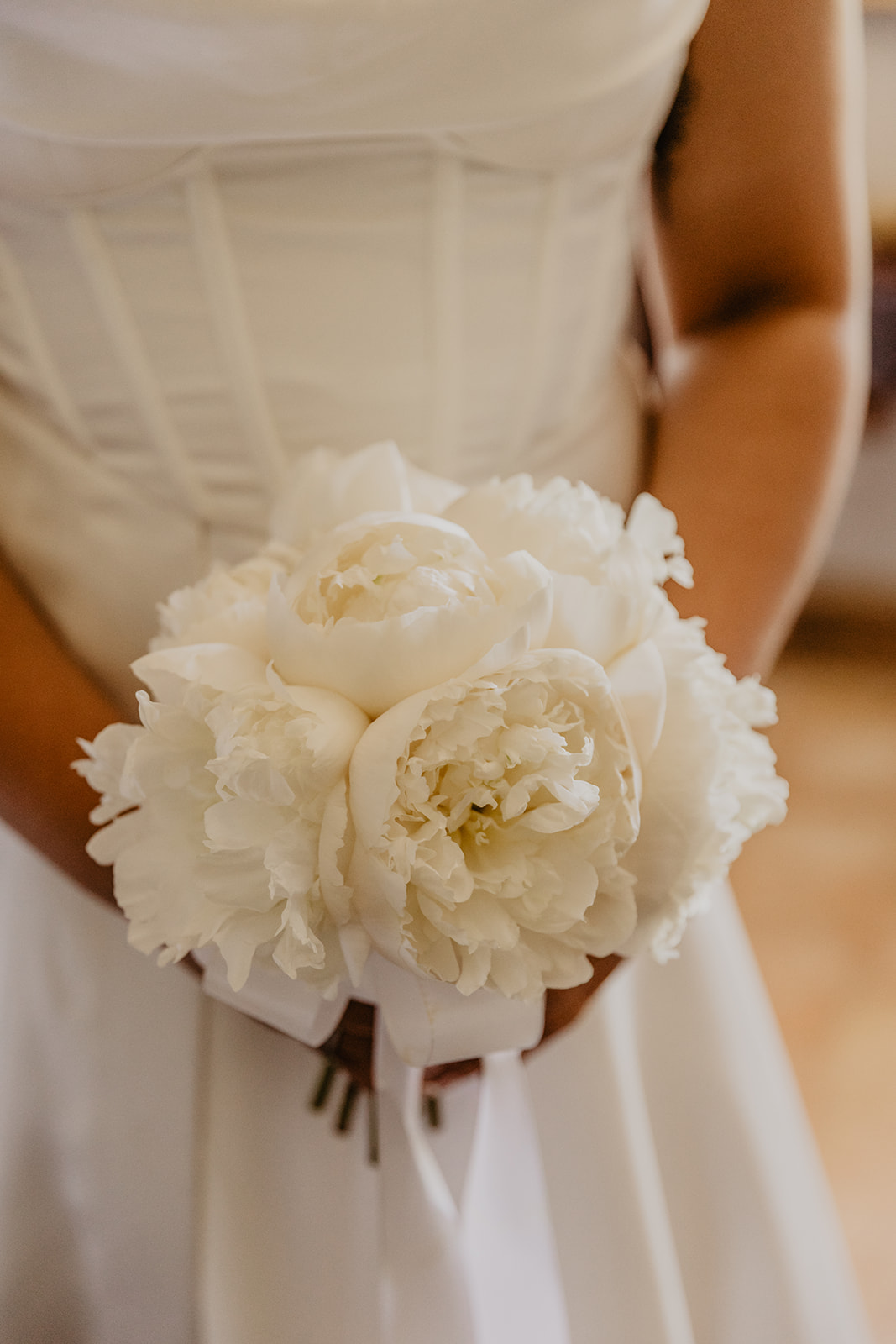 Bride and her bouquet at a France Destination Wedding. Photography and Videography by Olive Joy Photography