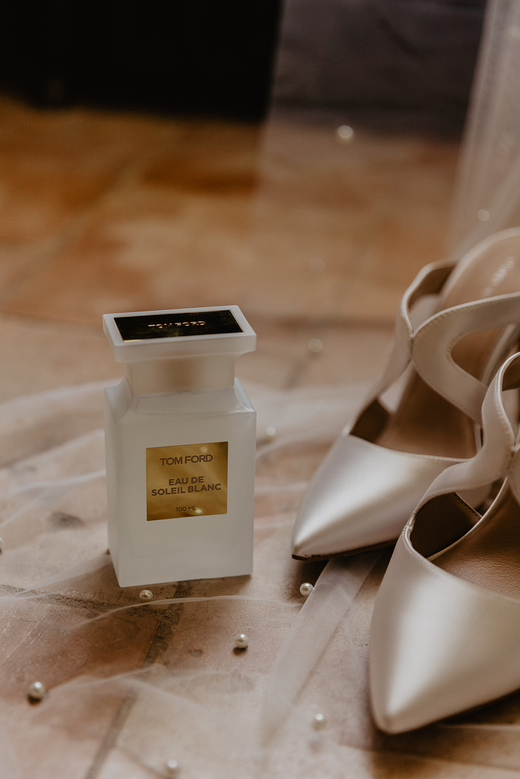 Bride shoes and perfume at a France Destination Wedding. Photography and Videography by Olive Joy Photography
