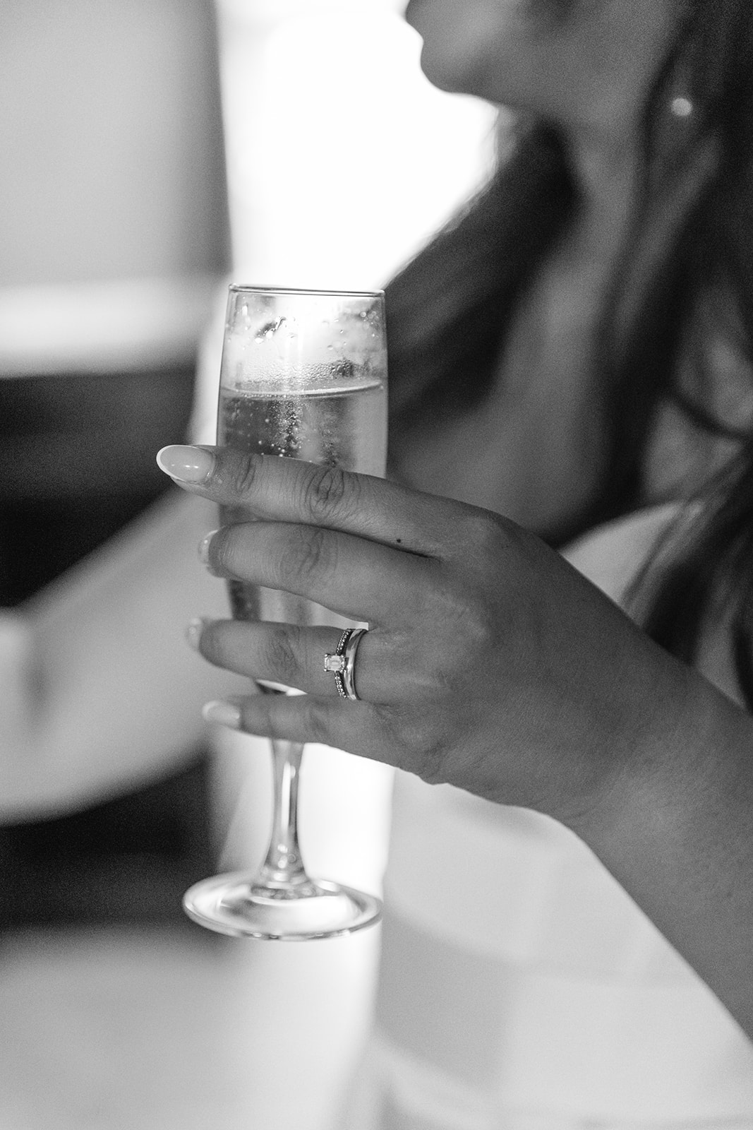 Champagne in hand of bride at a France Destination Wedding. Photography and Videography by Olive Joy Photography
