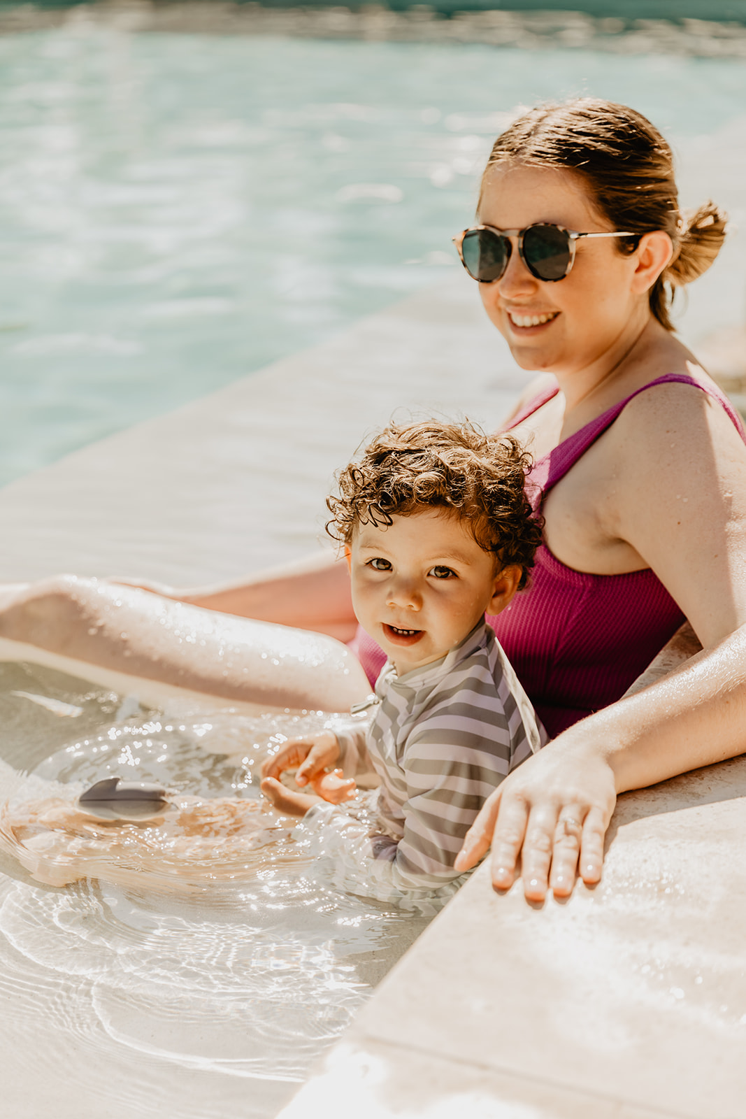 Mother and child in pool at a France Destination Wedding. Photography and Videography by Olive Joy Photography