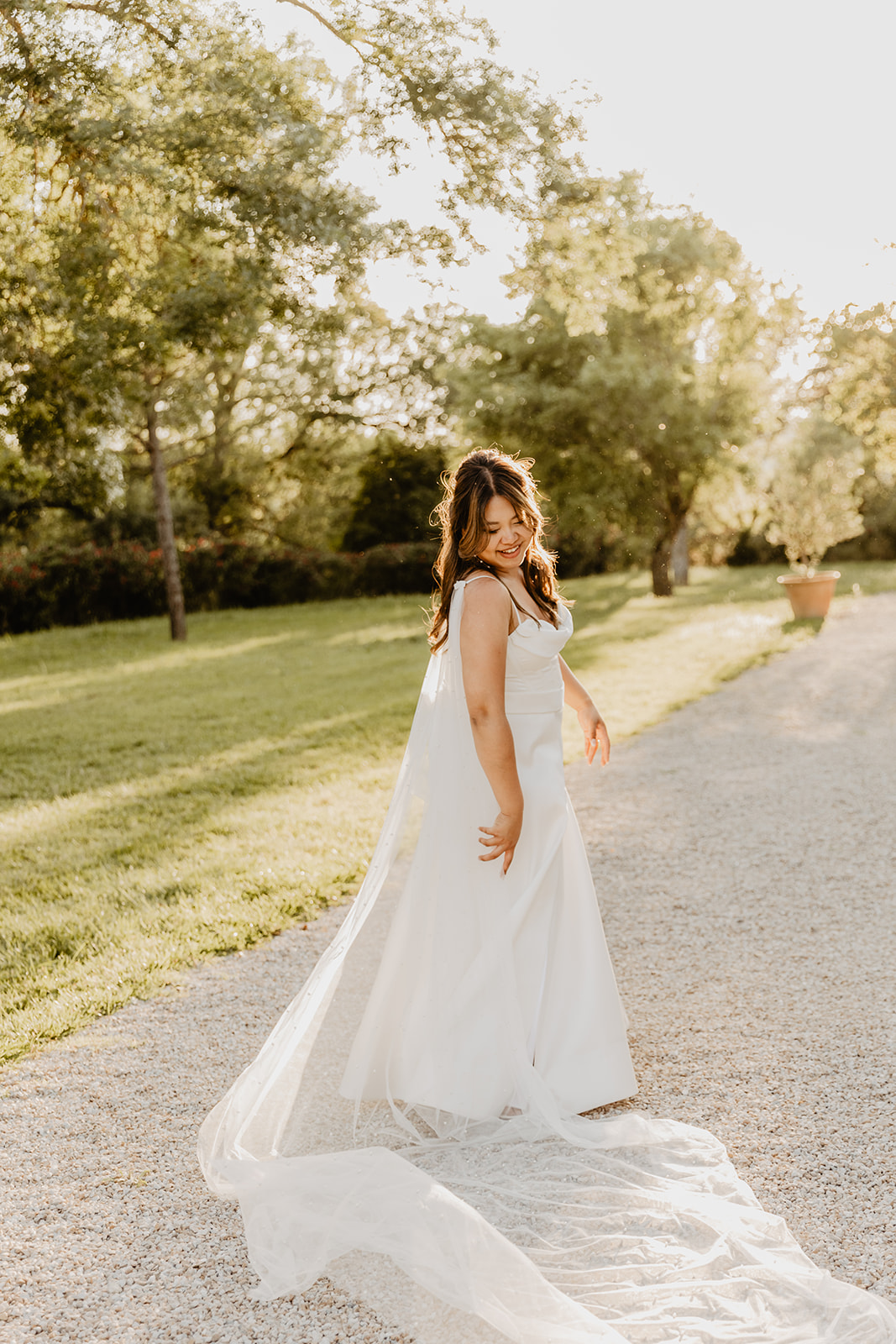 Bride during golden hour at a Destination Wedding in France. Photography & Videography by OliveJoy Photography