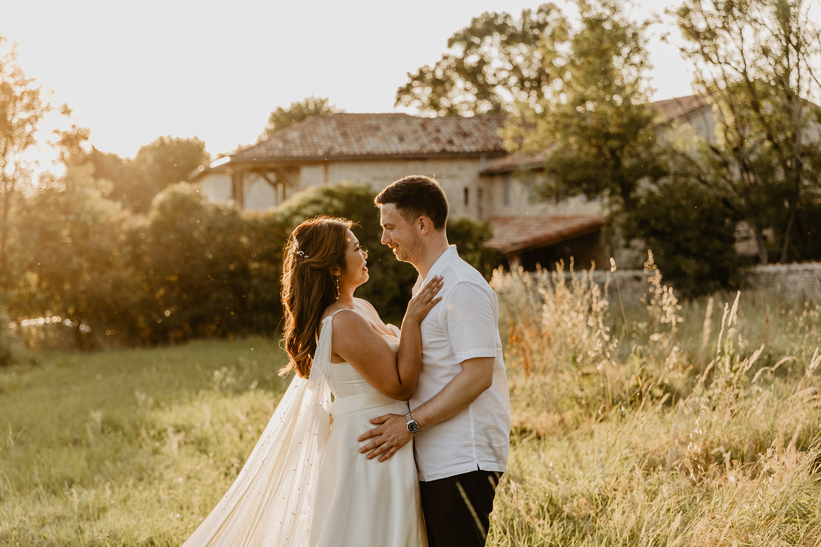 Bride and groom at golden hour at a Destination Wedding in France. Photography & Videography by OliveJoy Photography