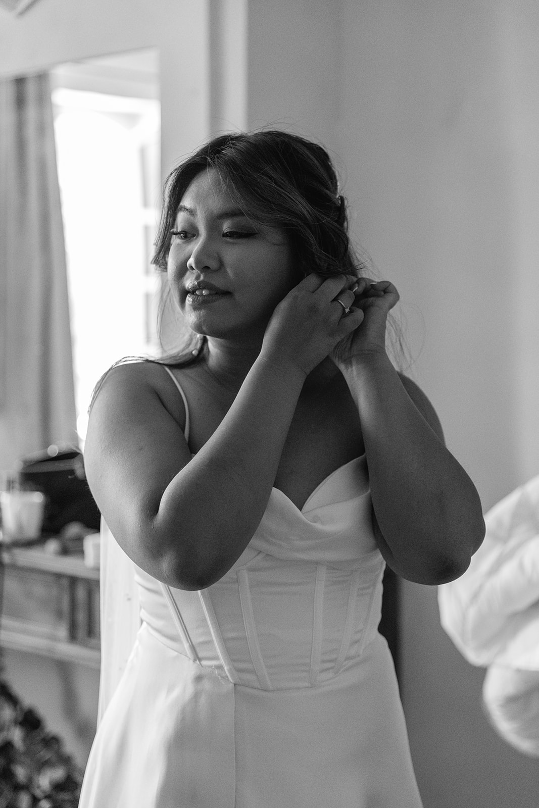Bride preparing herself at a Destination Wedding in France. Photography & Videography by OliveJoy Photography