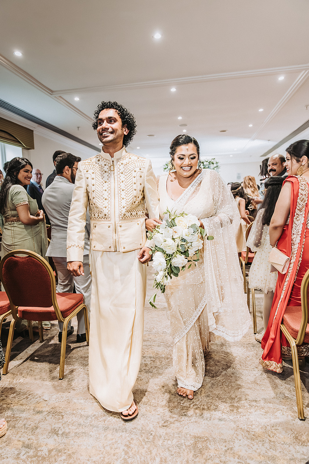 bride and groom at their poruwa ceremony in manchester
