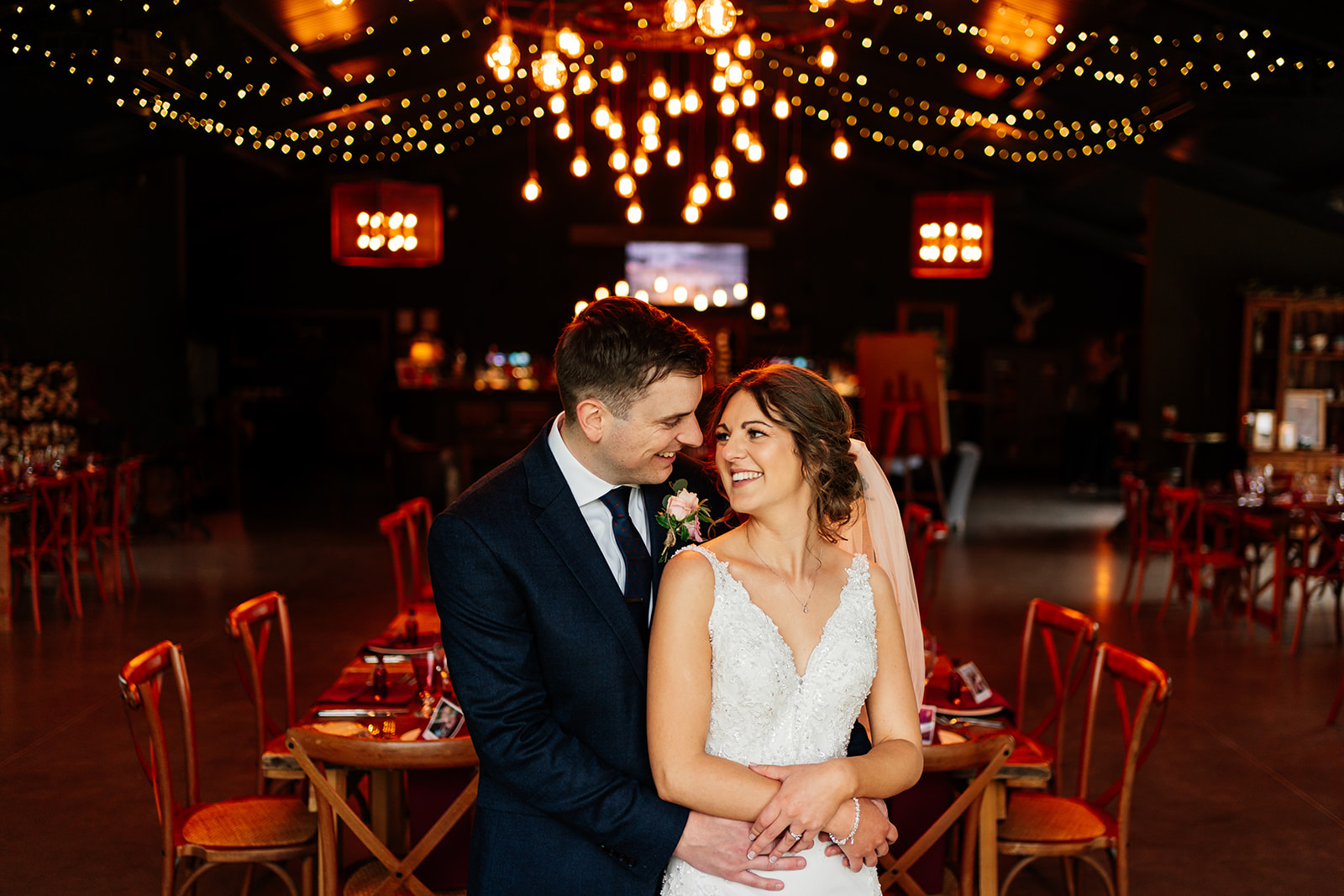 Indoor portrait of bride and groom at silchester farm 