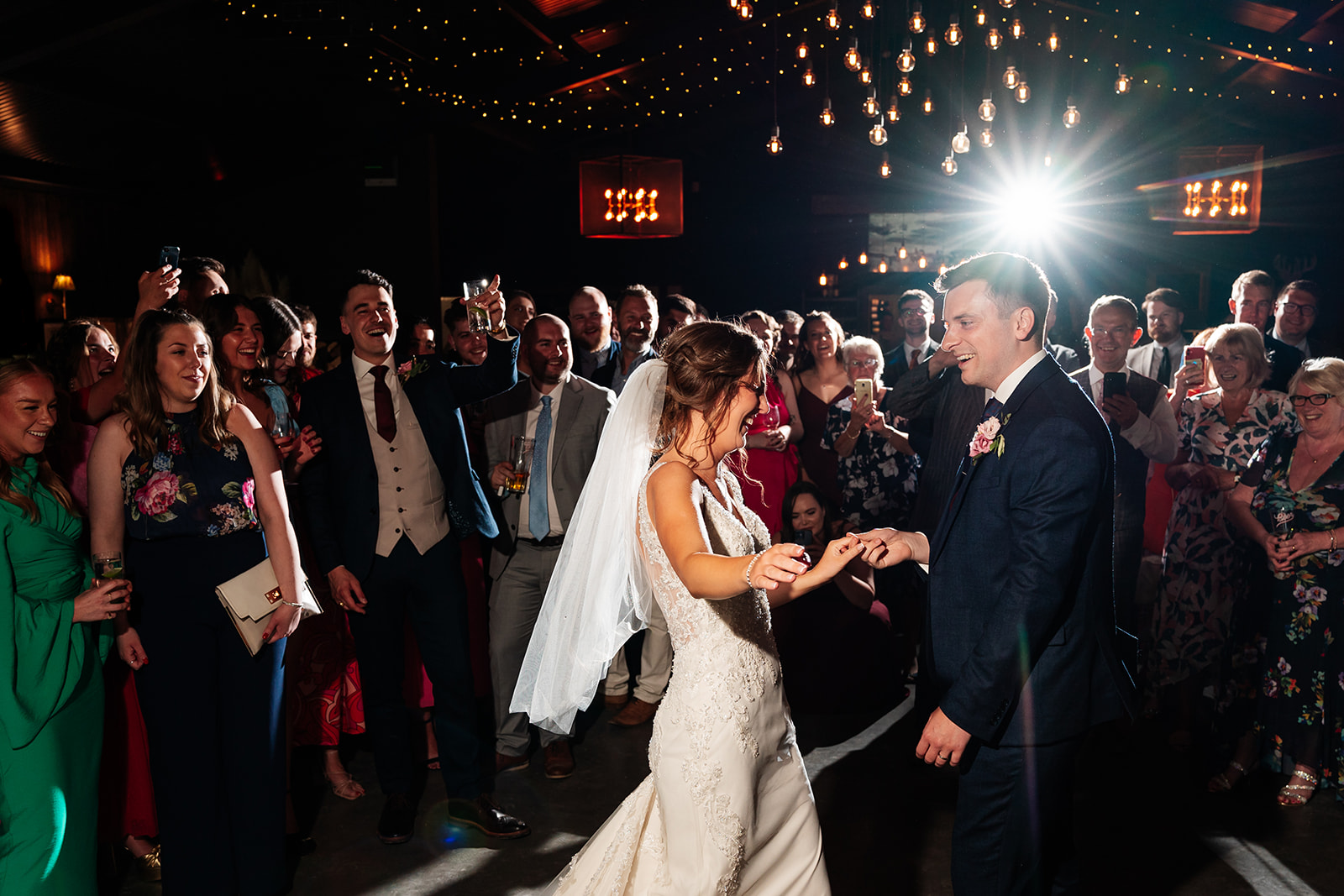 Bride and groom enjoying their first dance 
