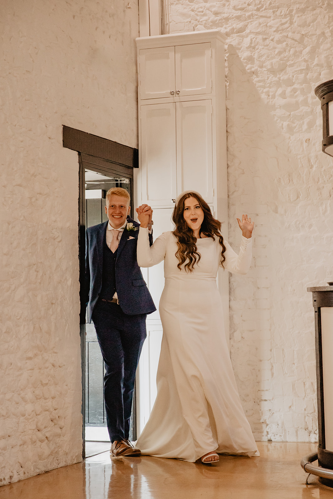 Bride and groom arrive at reception at a Field Place Manor House Wedding in Worthing, Sussex. By Olive Joy Photography