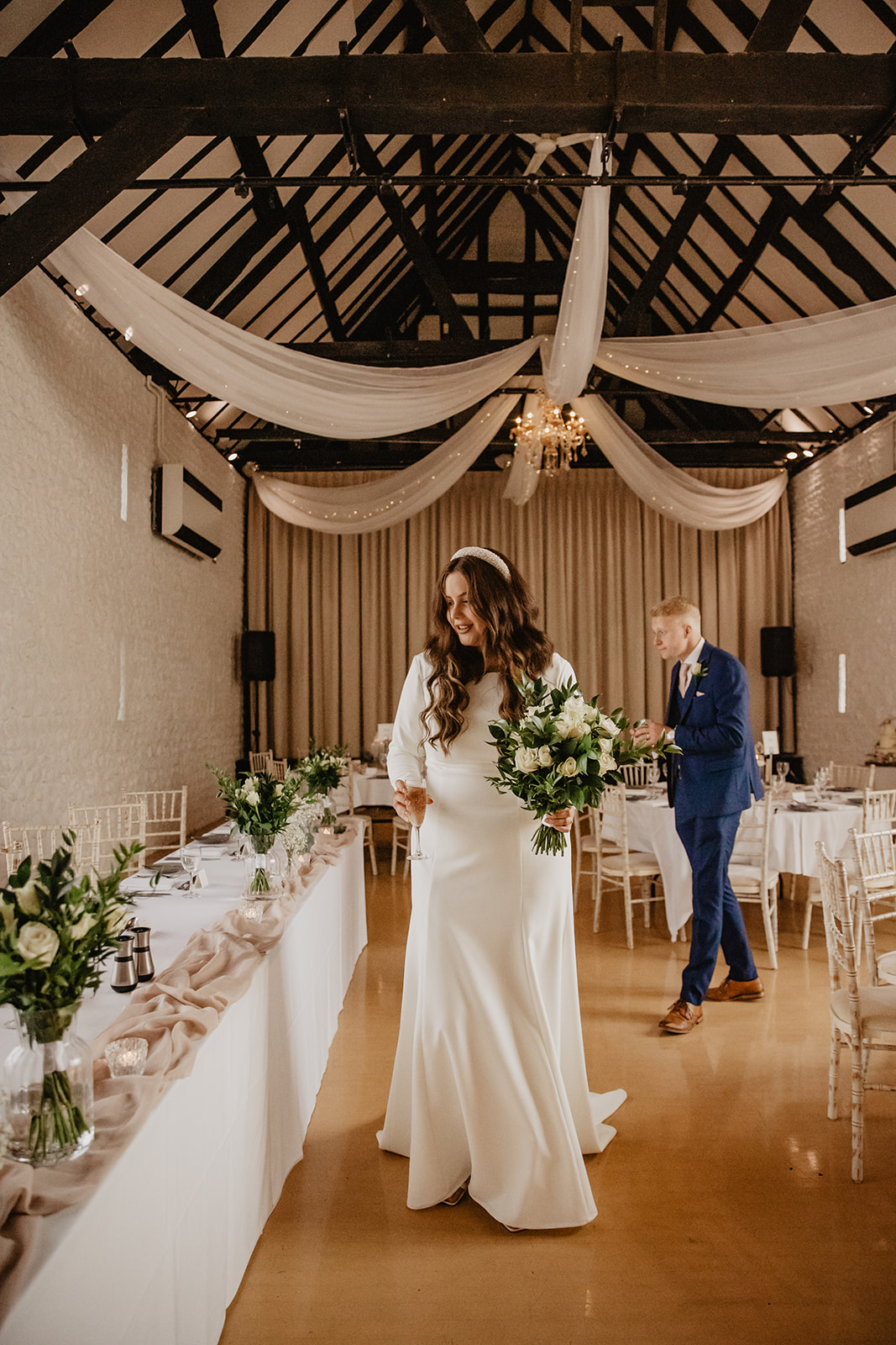 Bride at reception at a Field Place Manor House Wedding in Worthing, Sussex. By Olive Joy Photography